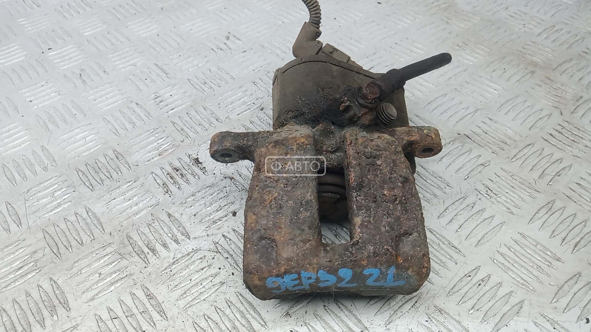 Суппорт тормозной задний левый