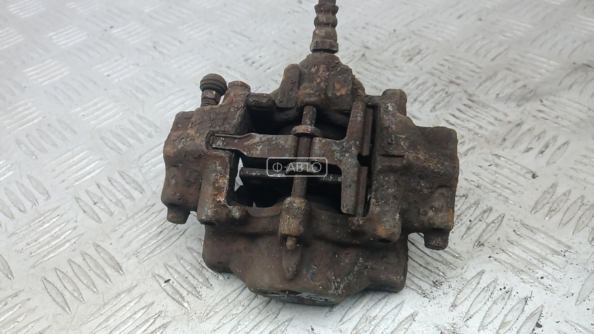 Суппорт тормозной задний левый