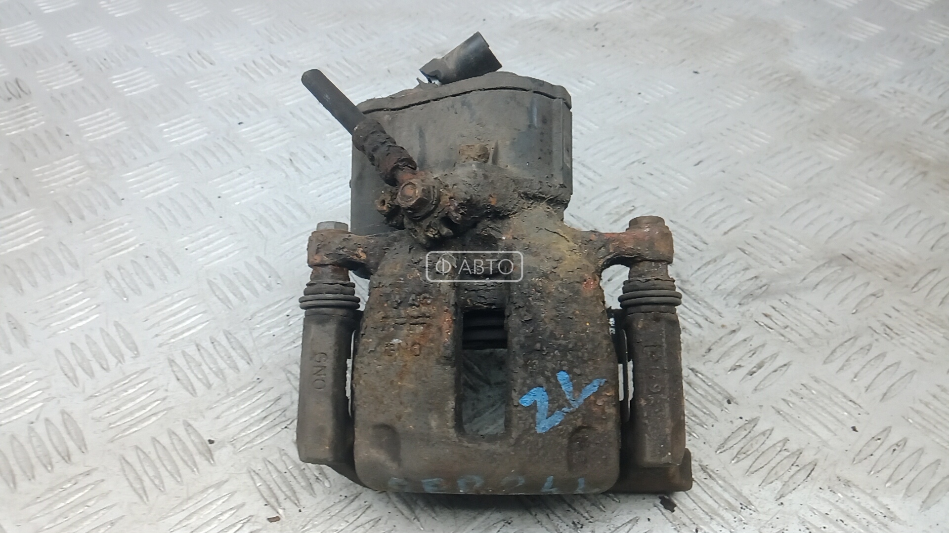 Суппорт тормозной задний левый