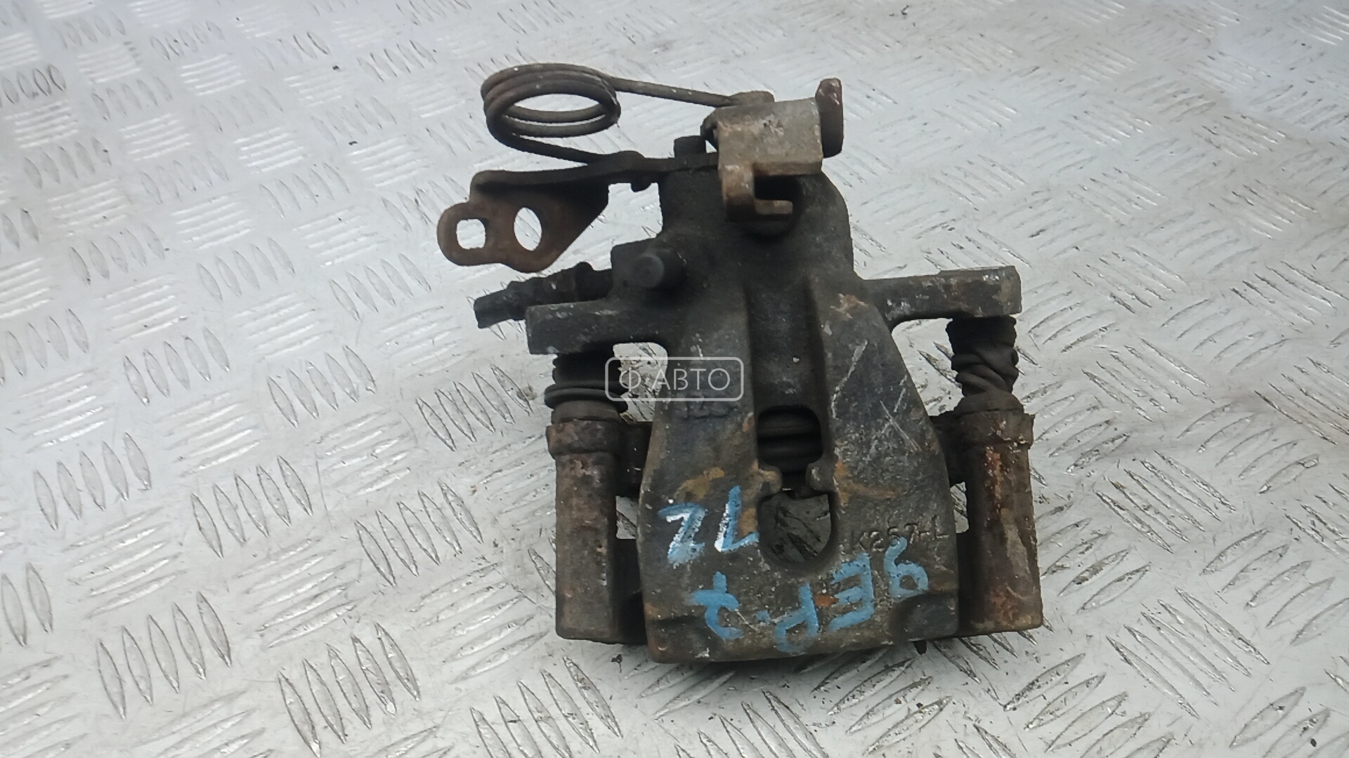 Суппорт тормозной задний левый