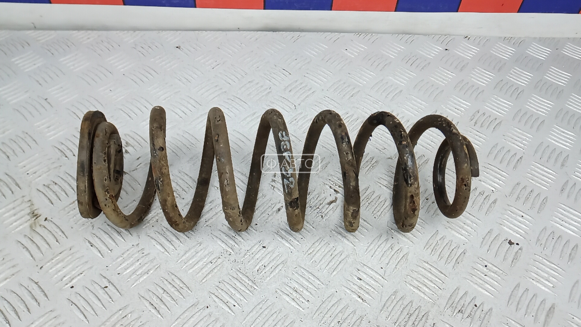 Пружина задняя