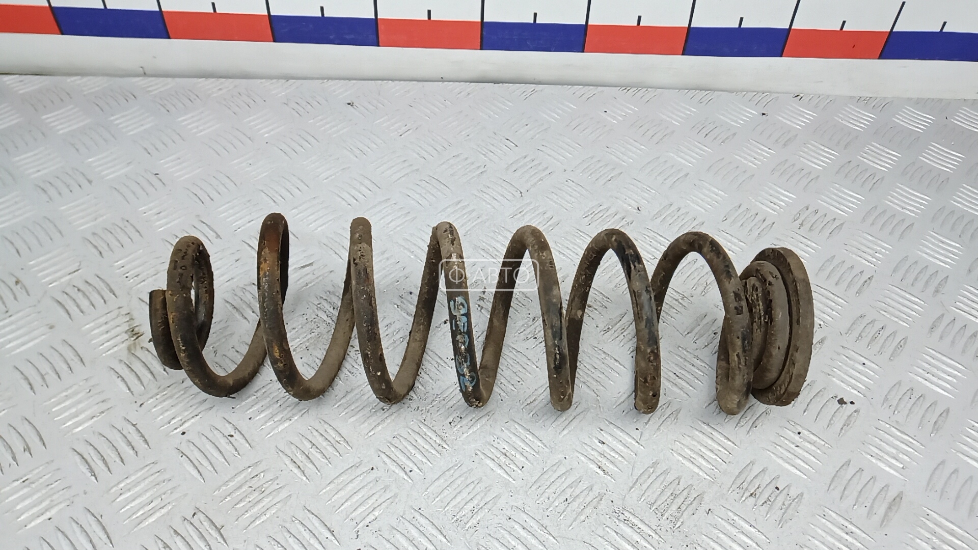 Пружина задняя