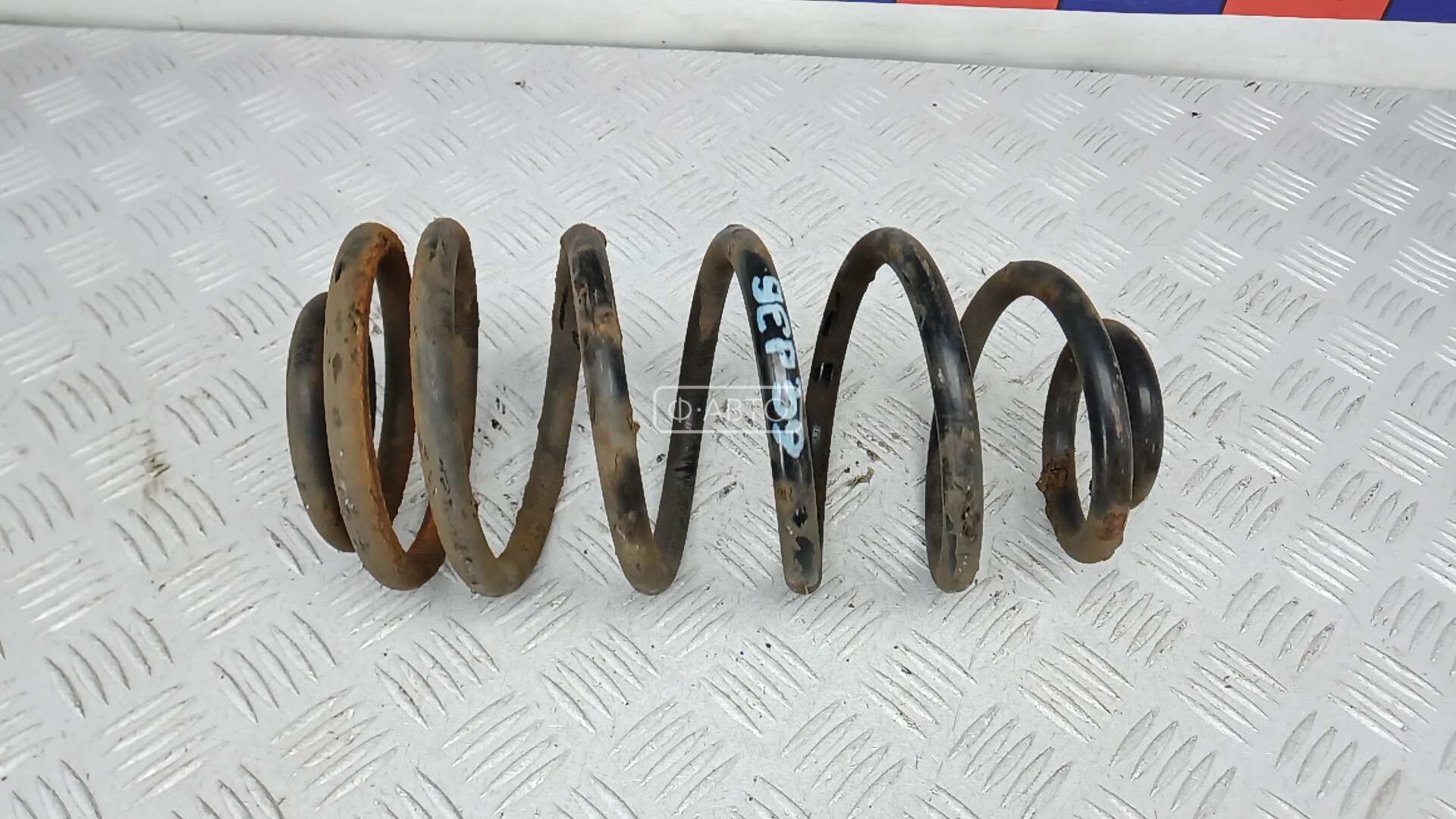 Пружина задняя