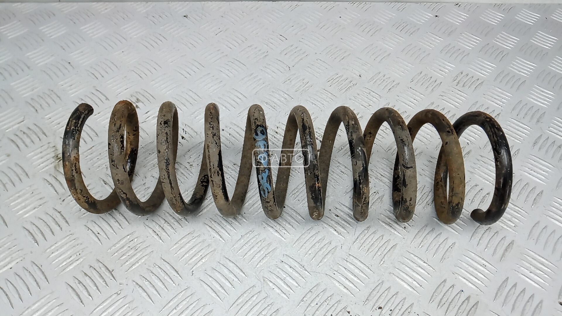 Пружина задняя