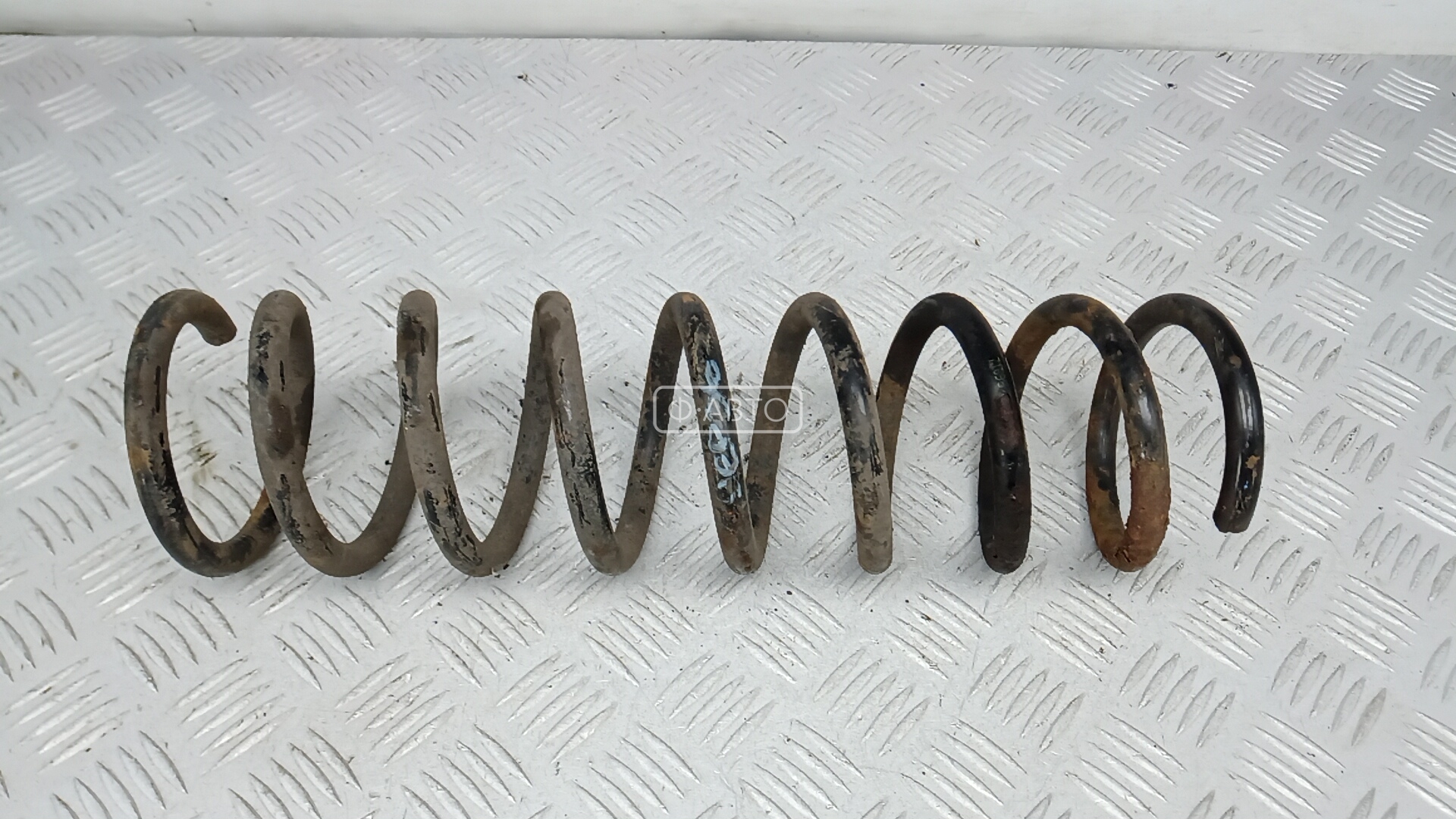 Пружина задняя