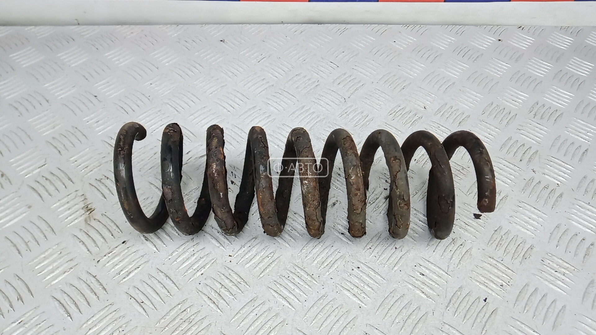 Пружина задняя