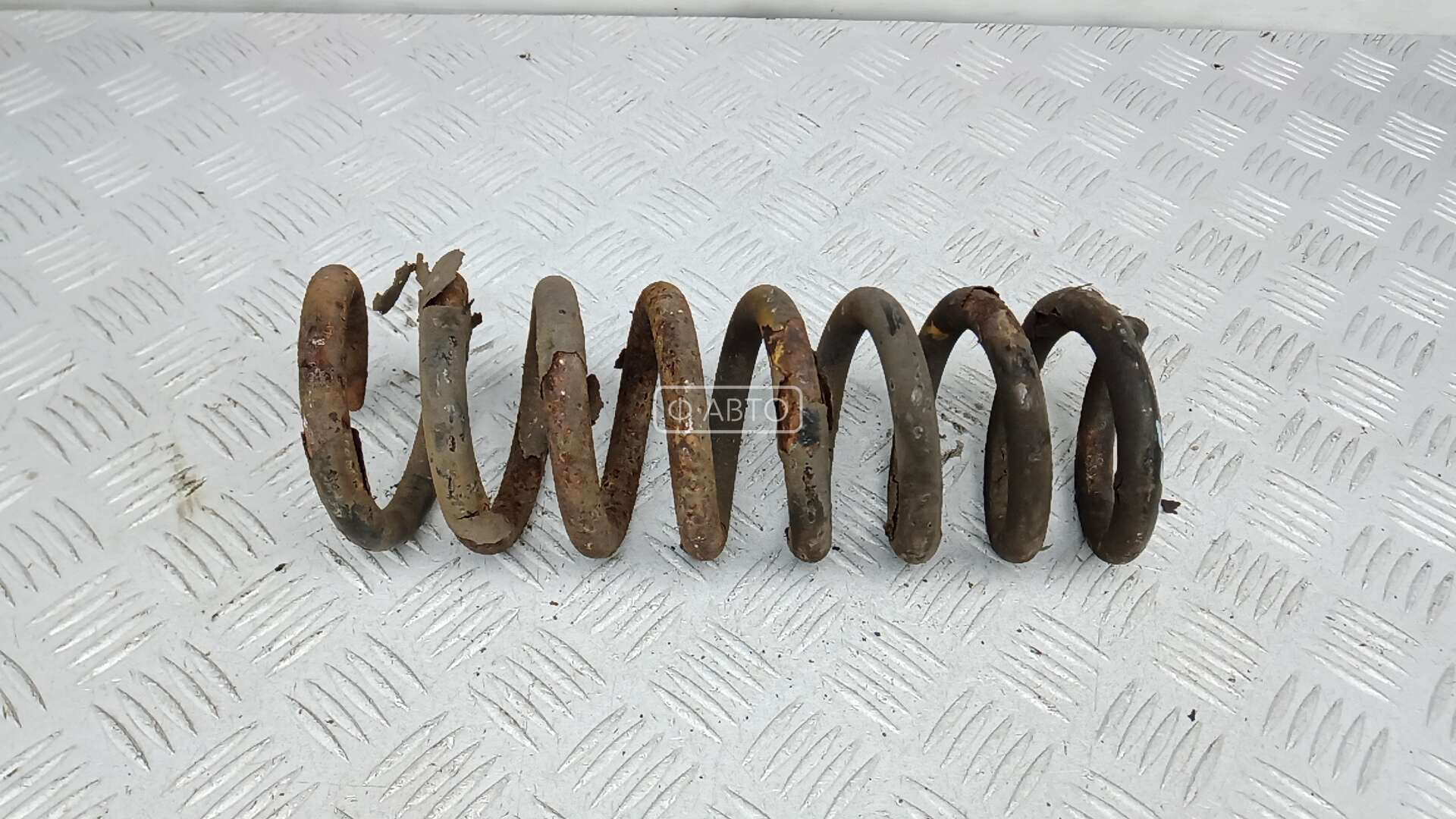 Пружина задняя