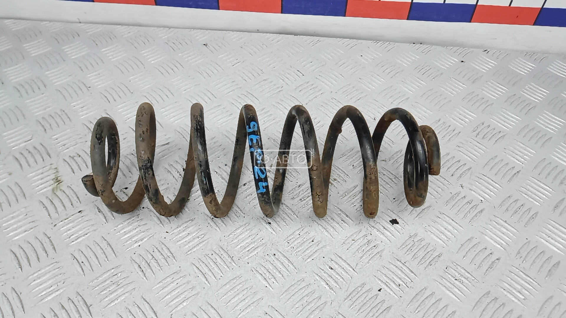 Пружина задняя