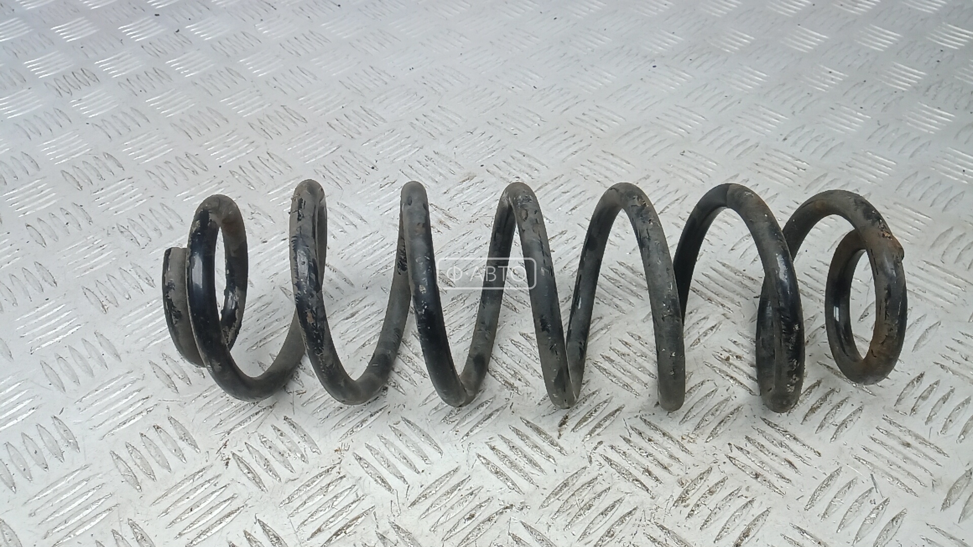 Пружина задняя