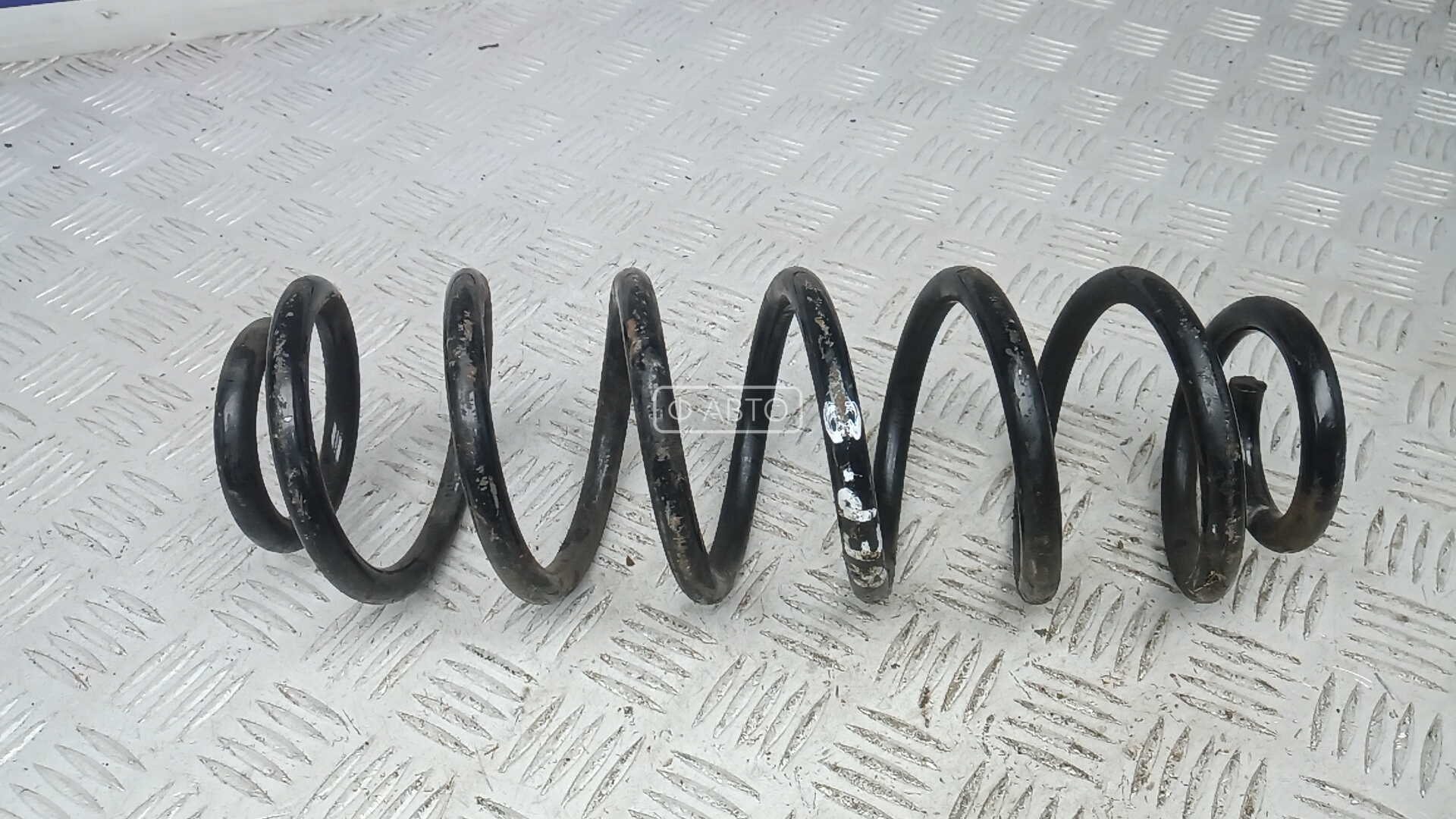 Пружина задняя