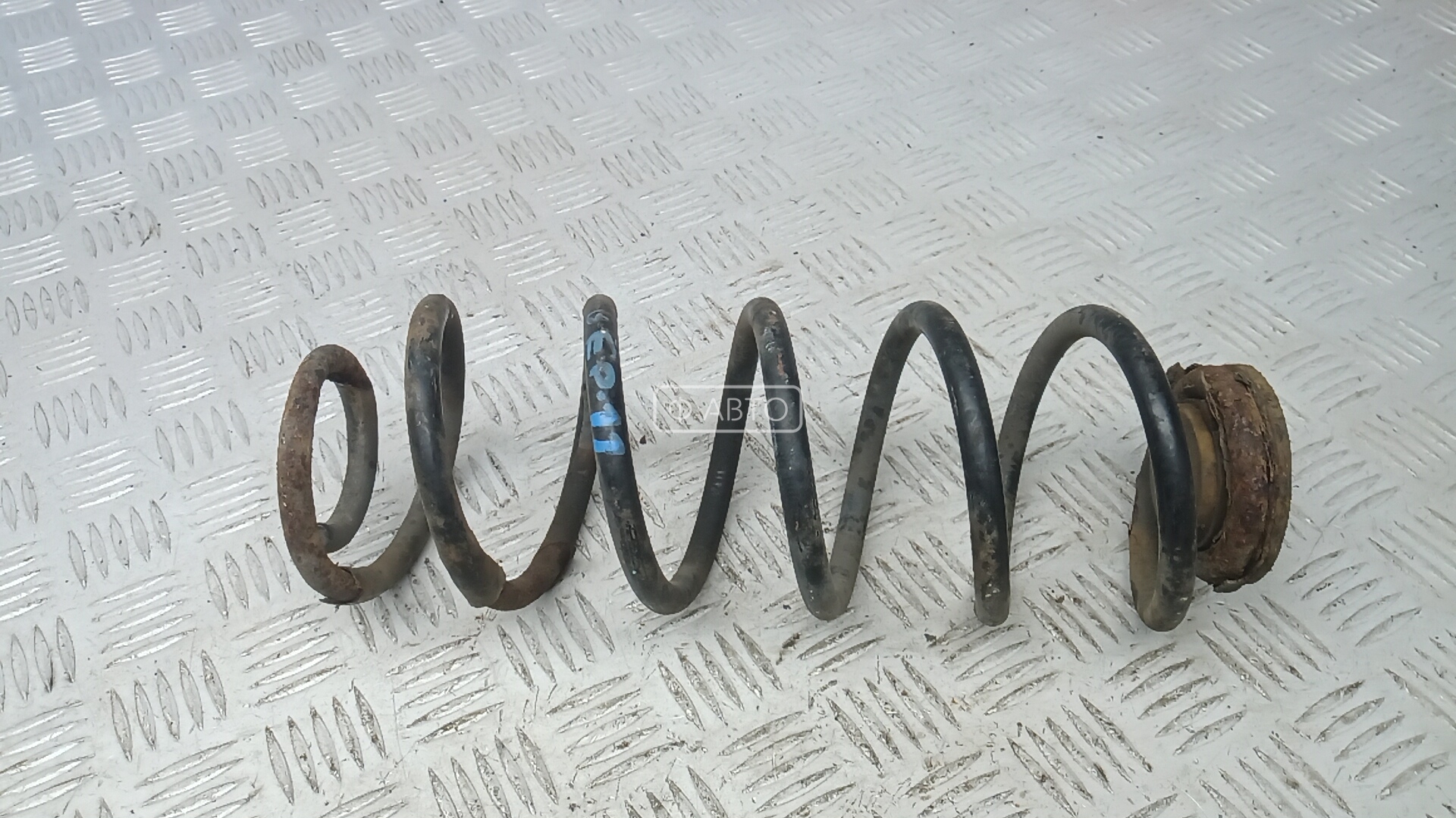 Пружина задняя