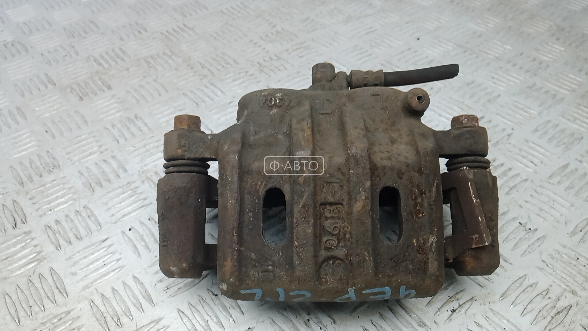 Суппорт тормозной передний левый