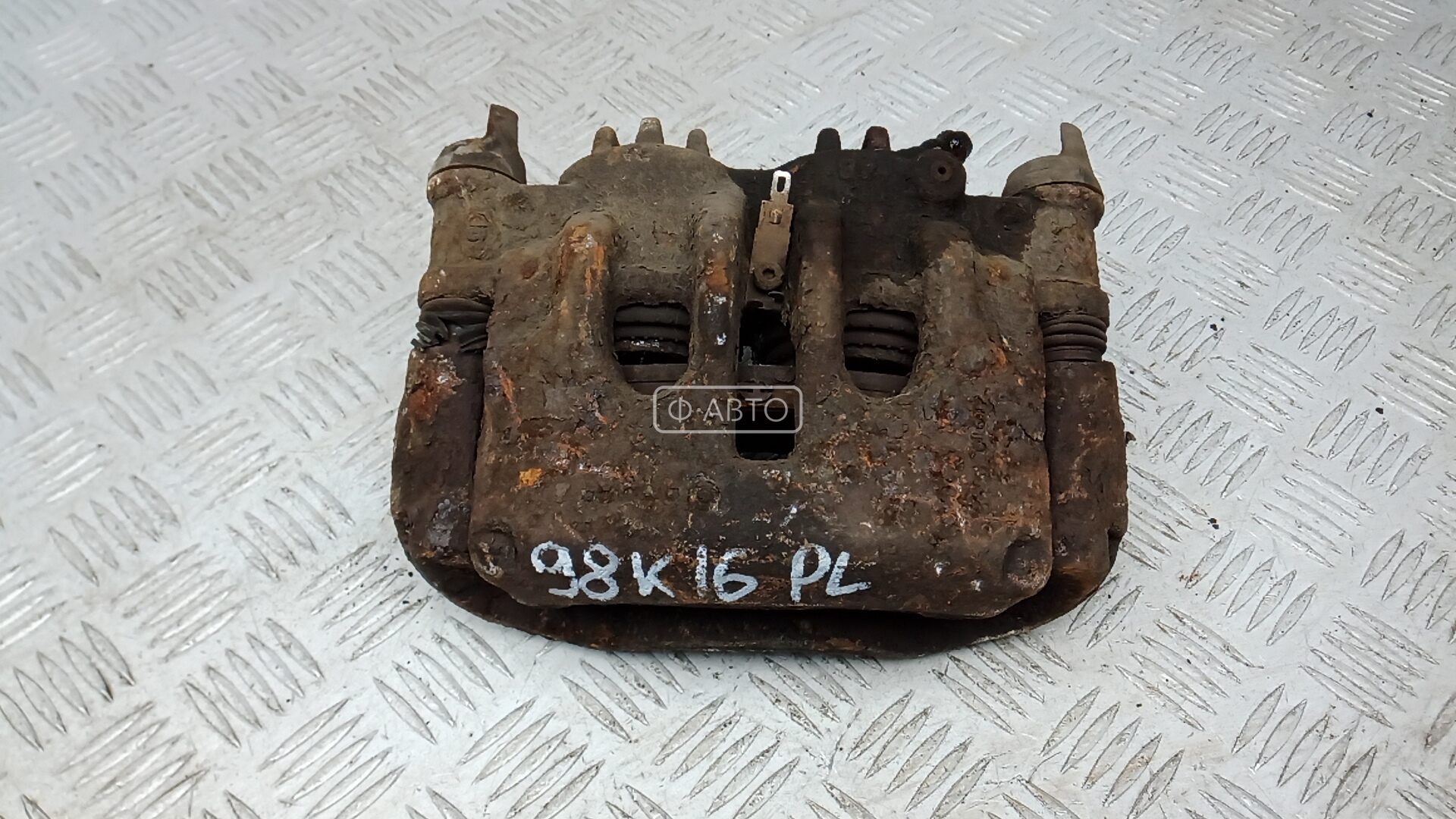 Суппорт тормозной передний левый