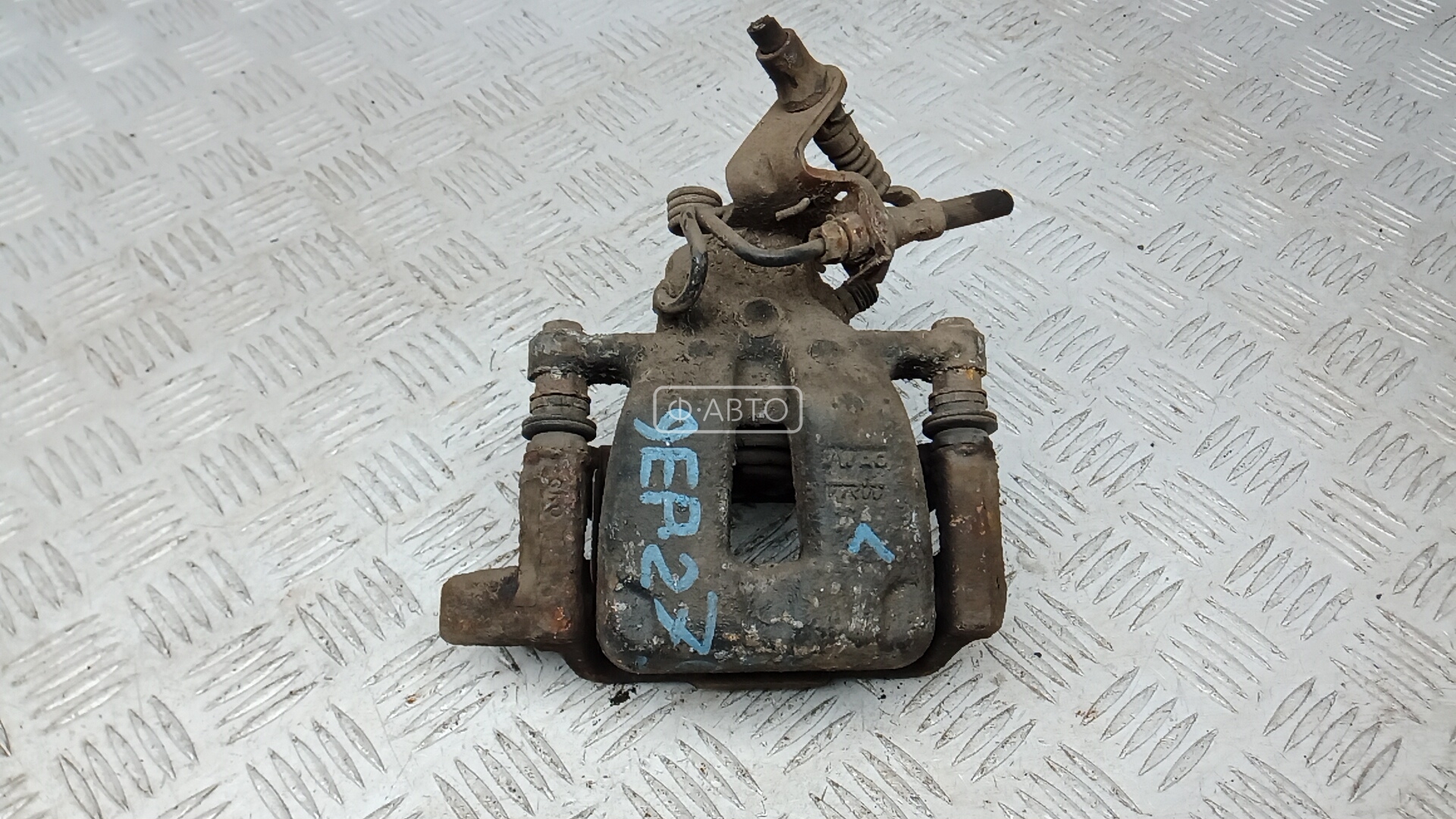 Суппорт тормозной задний левый