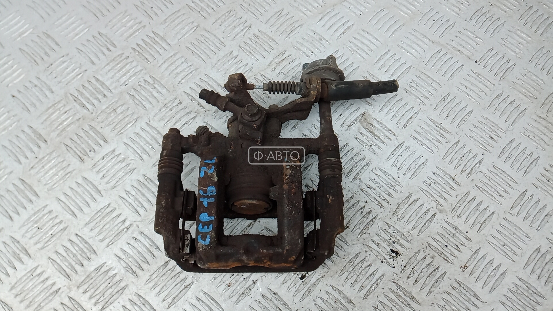 Суппорт тормозной задний левый