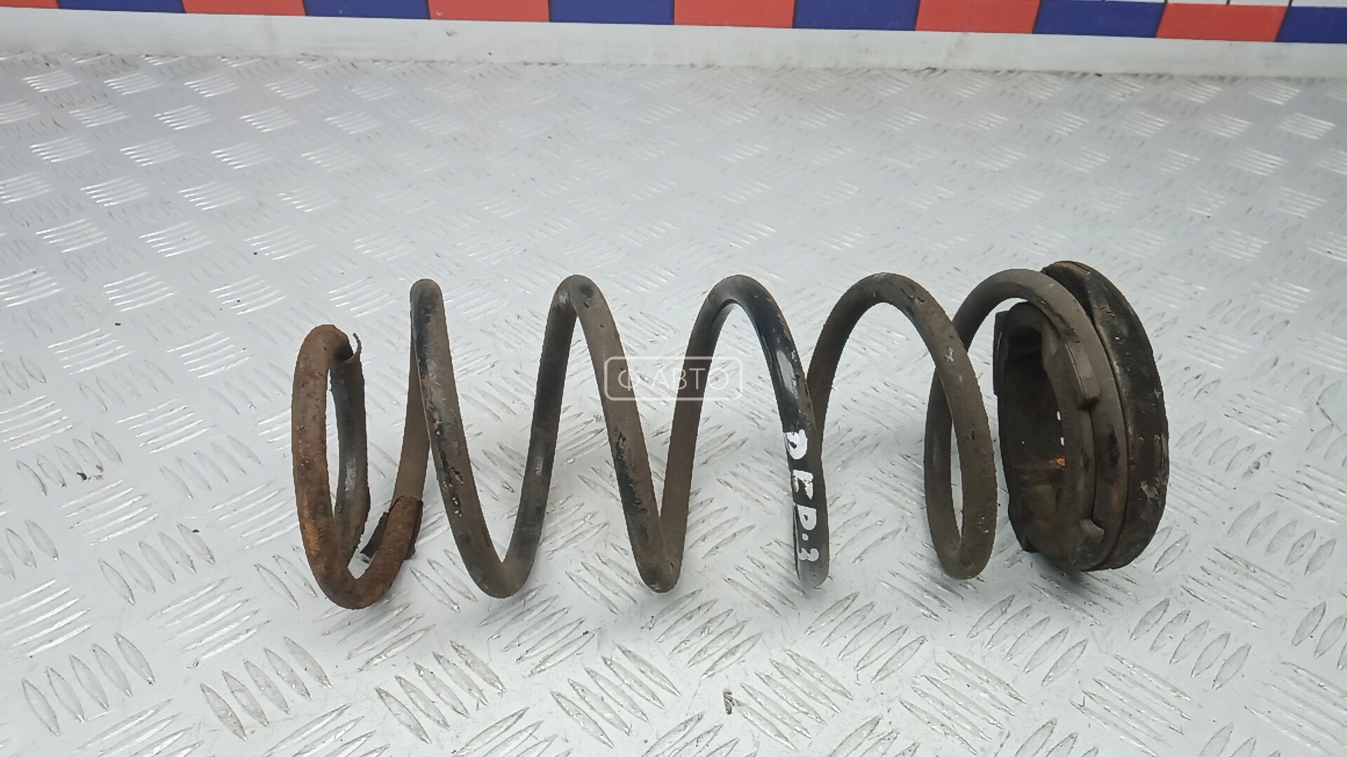 Пружина задняя