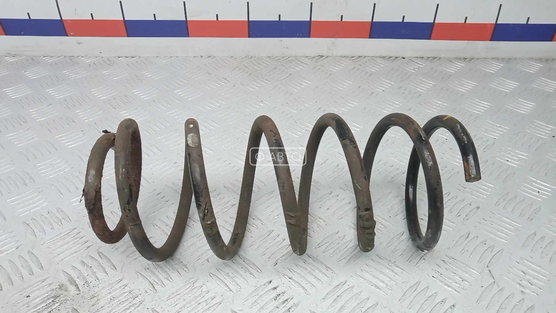 Пружина задняя