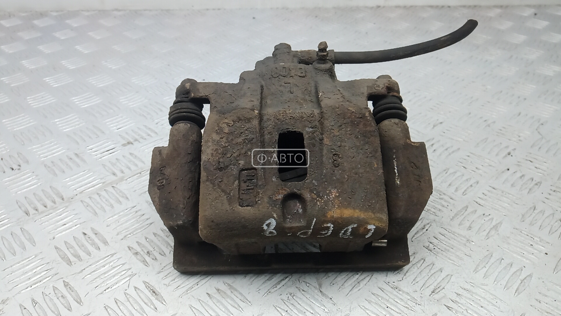 Суппорт тормозной передний левый