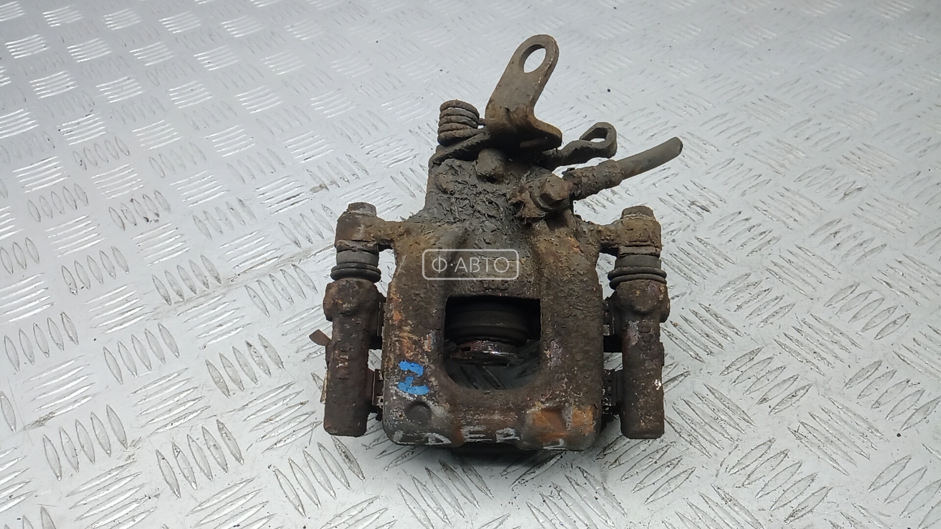 Суппорт тормозной задний левый