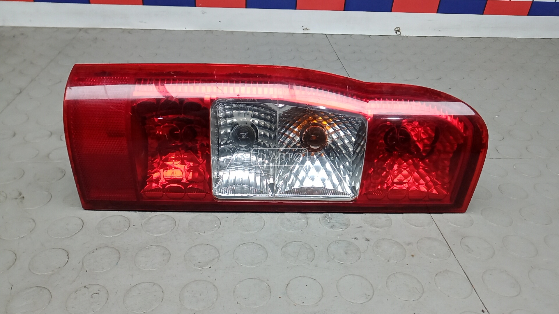 Фонарь задний левый