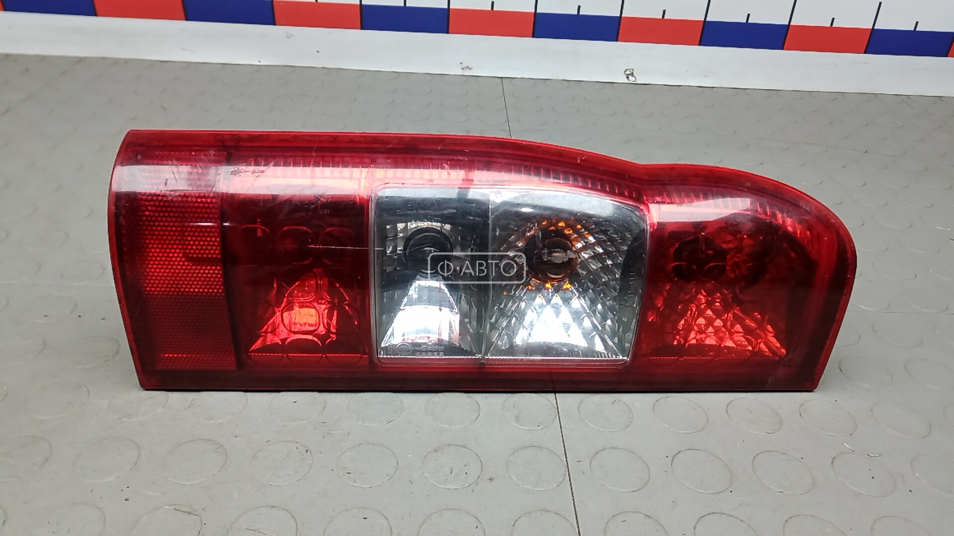 Фонарь задний левый