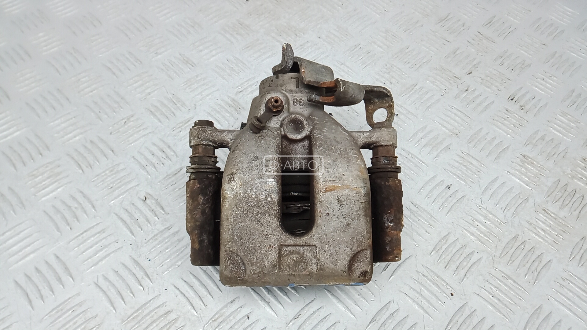 Суппорт тормозной задний левый