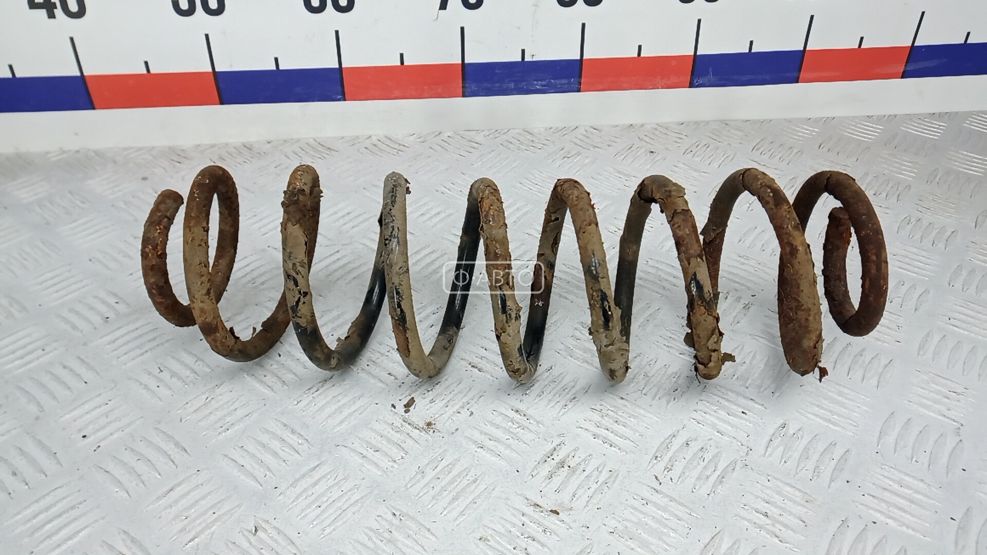 Пружина задняя