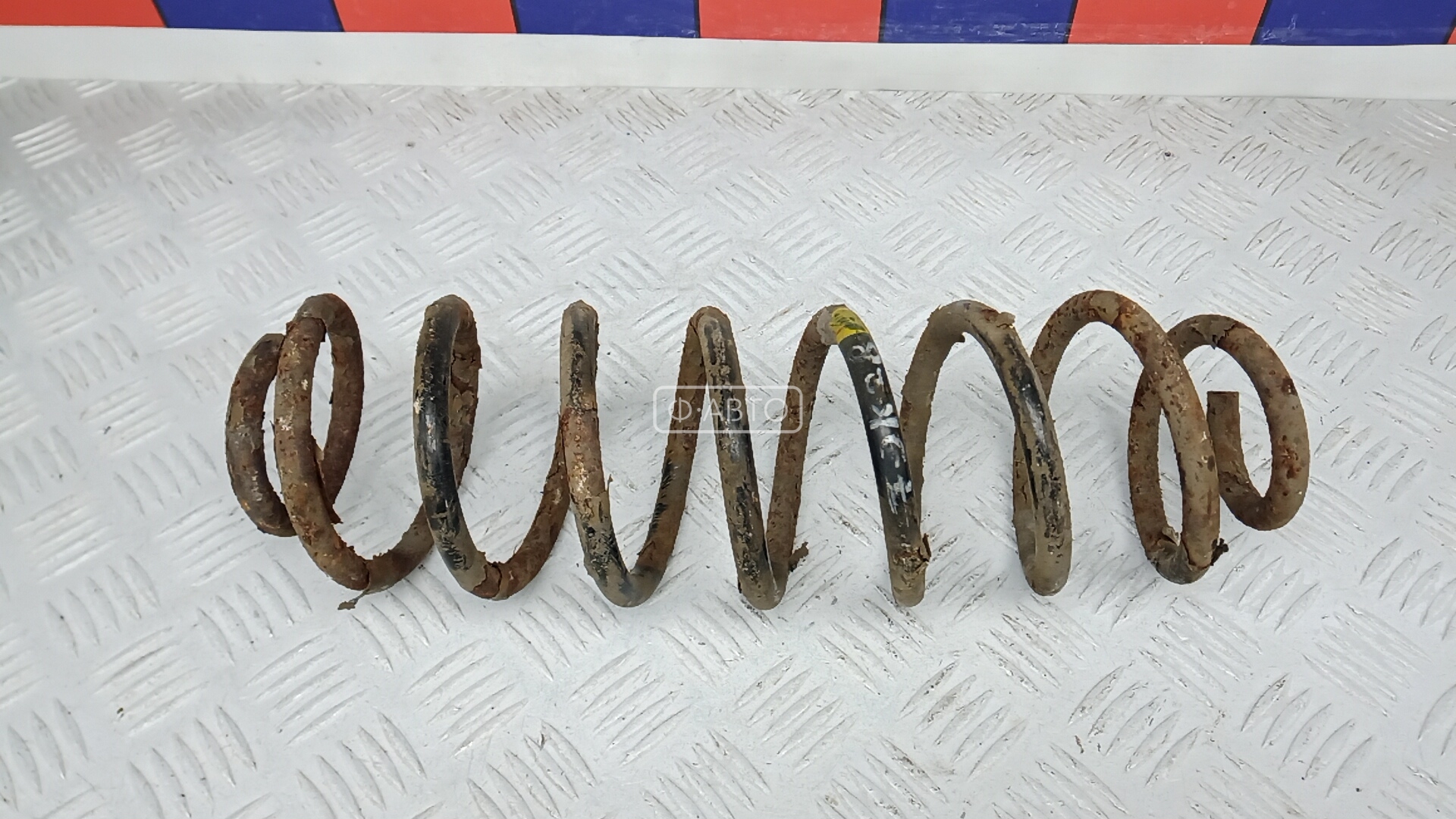 Пружина задняя