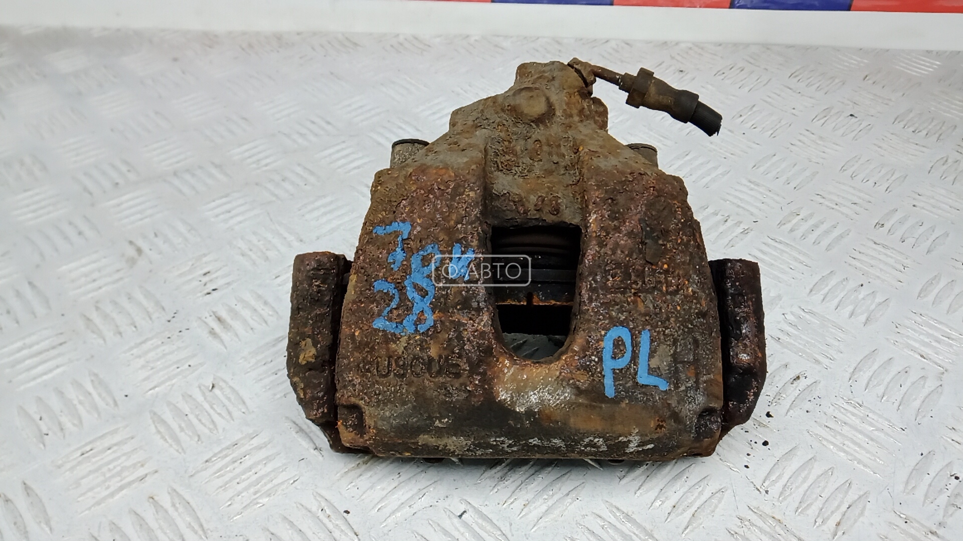 Суппорт тормозной передний левый