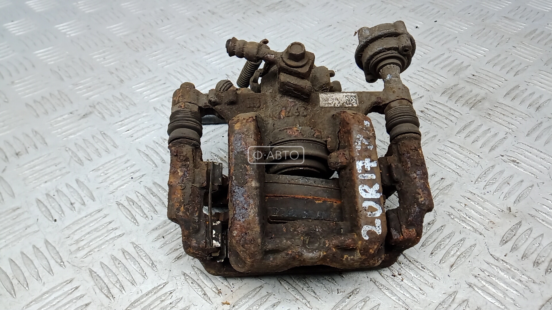 Суппорт тормозной задний левый