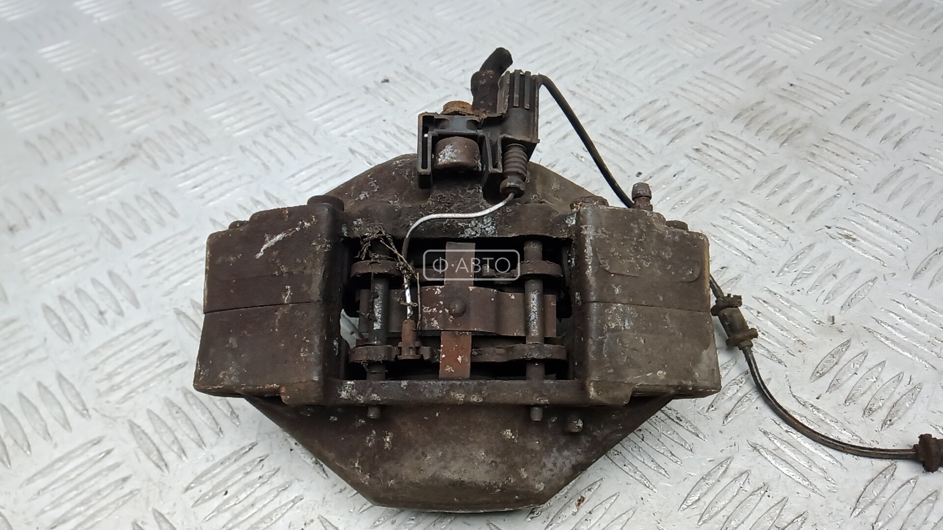 Суппорт тормозной задний левый