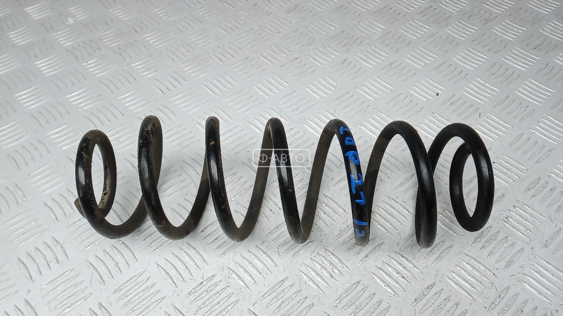 Пружина задняя