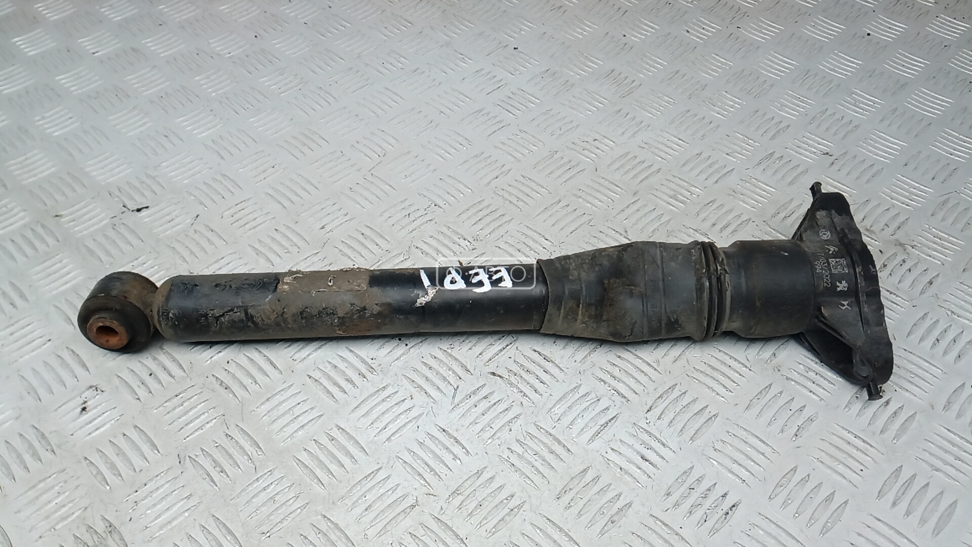 Амортизатор задней балки