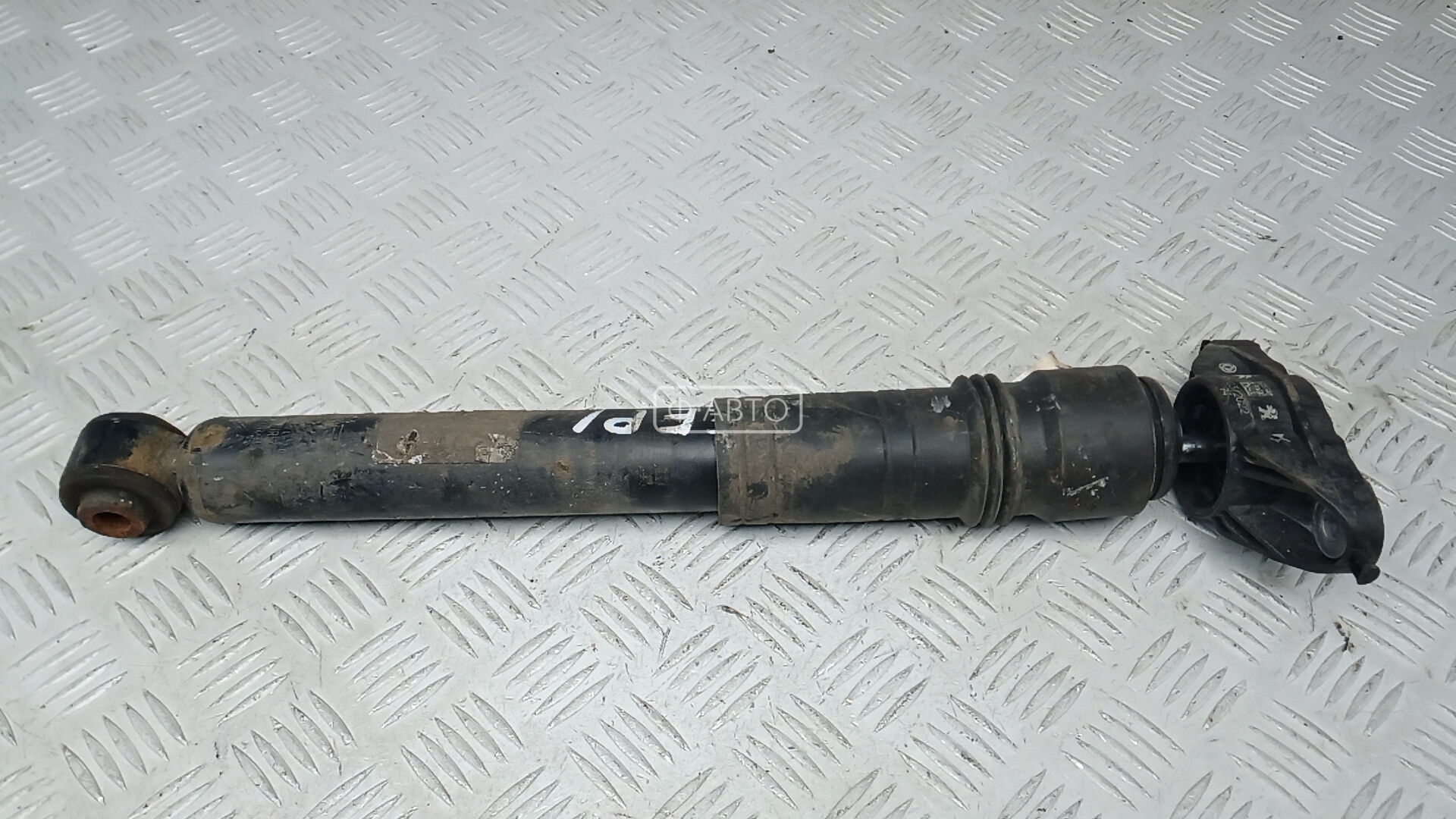 Амортизатор задней балки