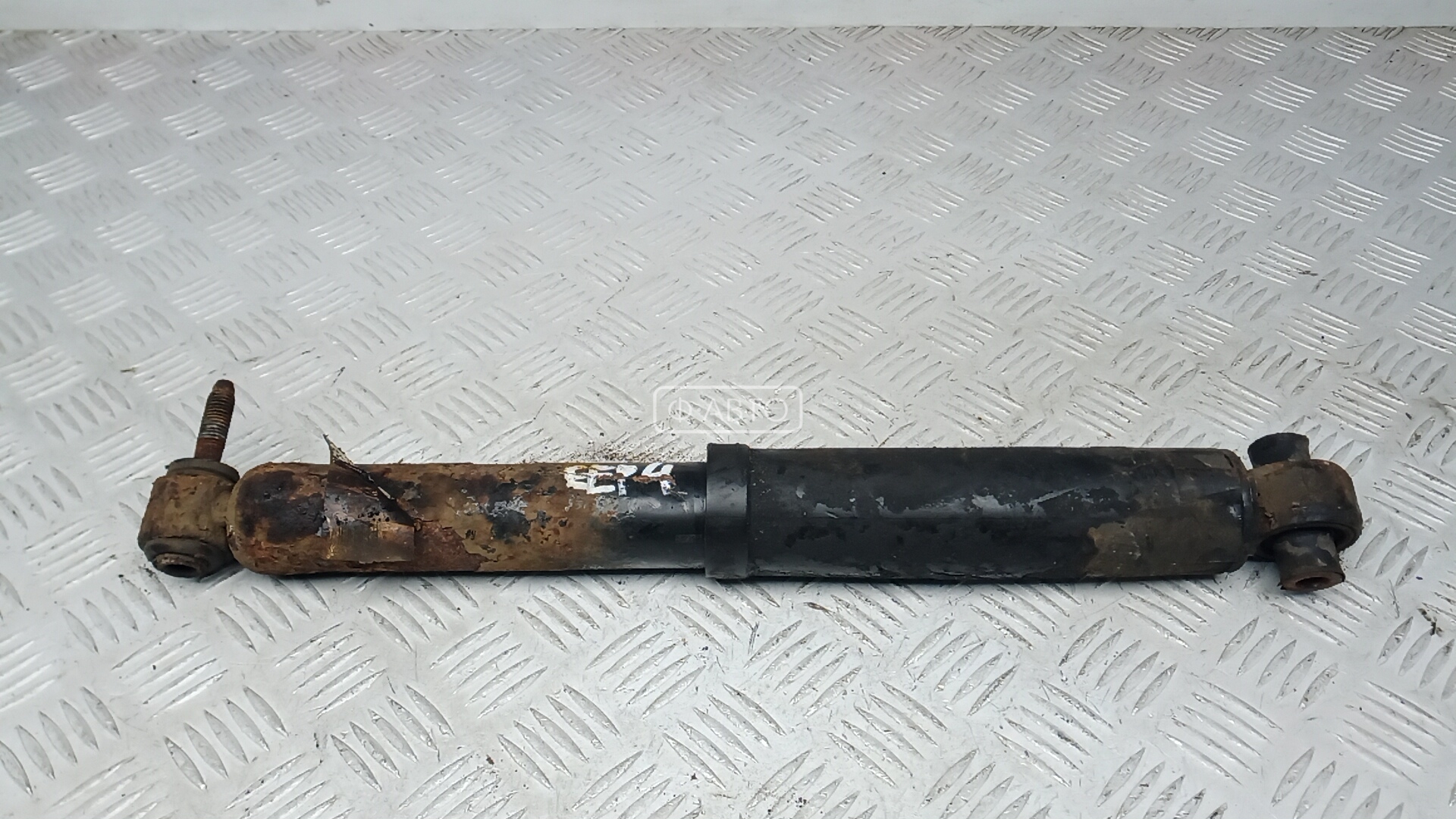 Амортизатор задней балки