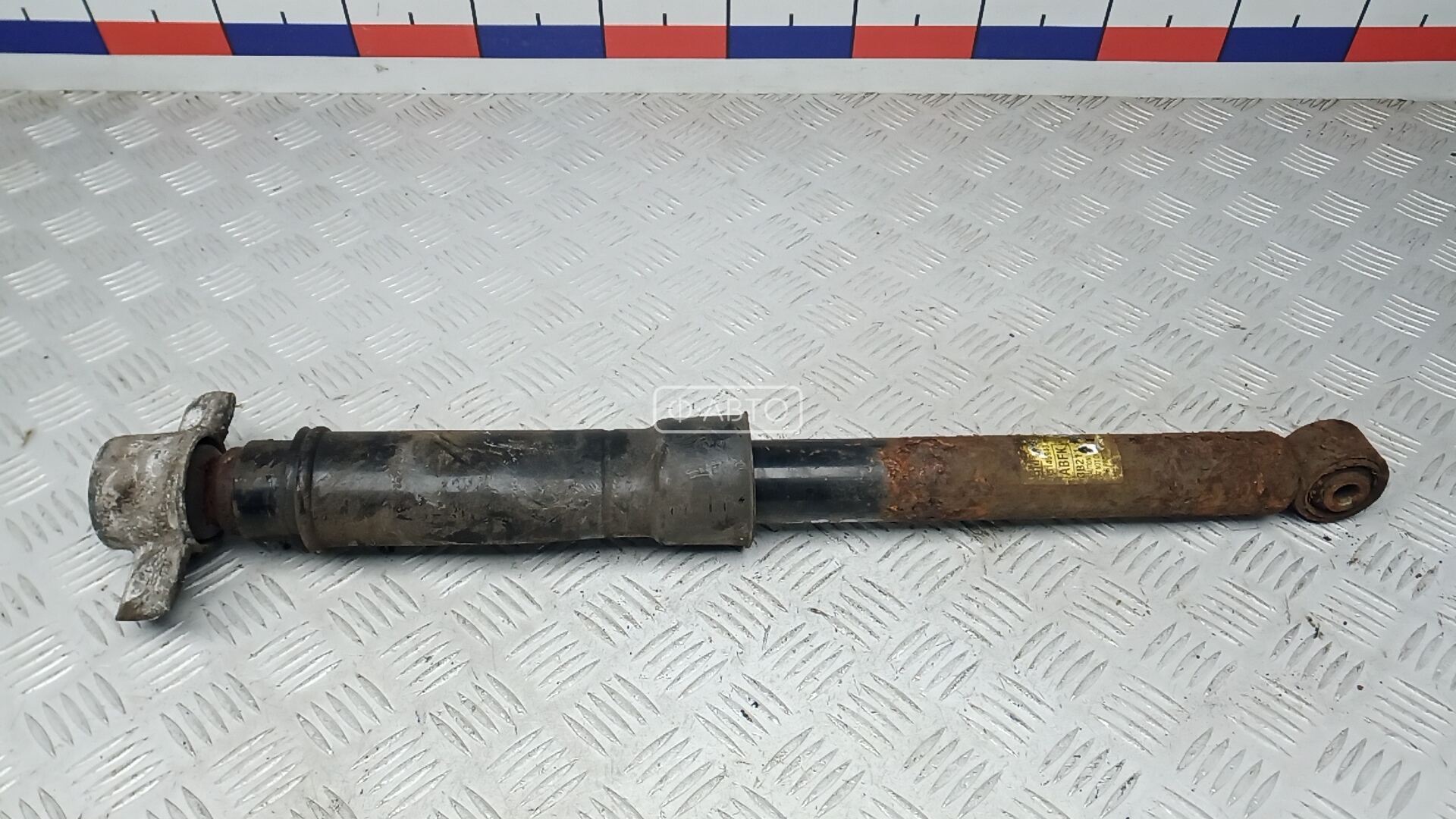 Амортизатор задней балки