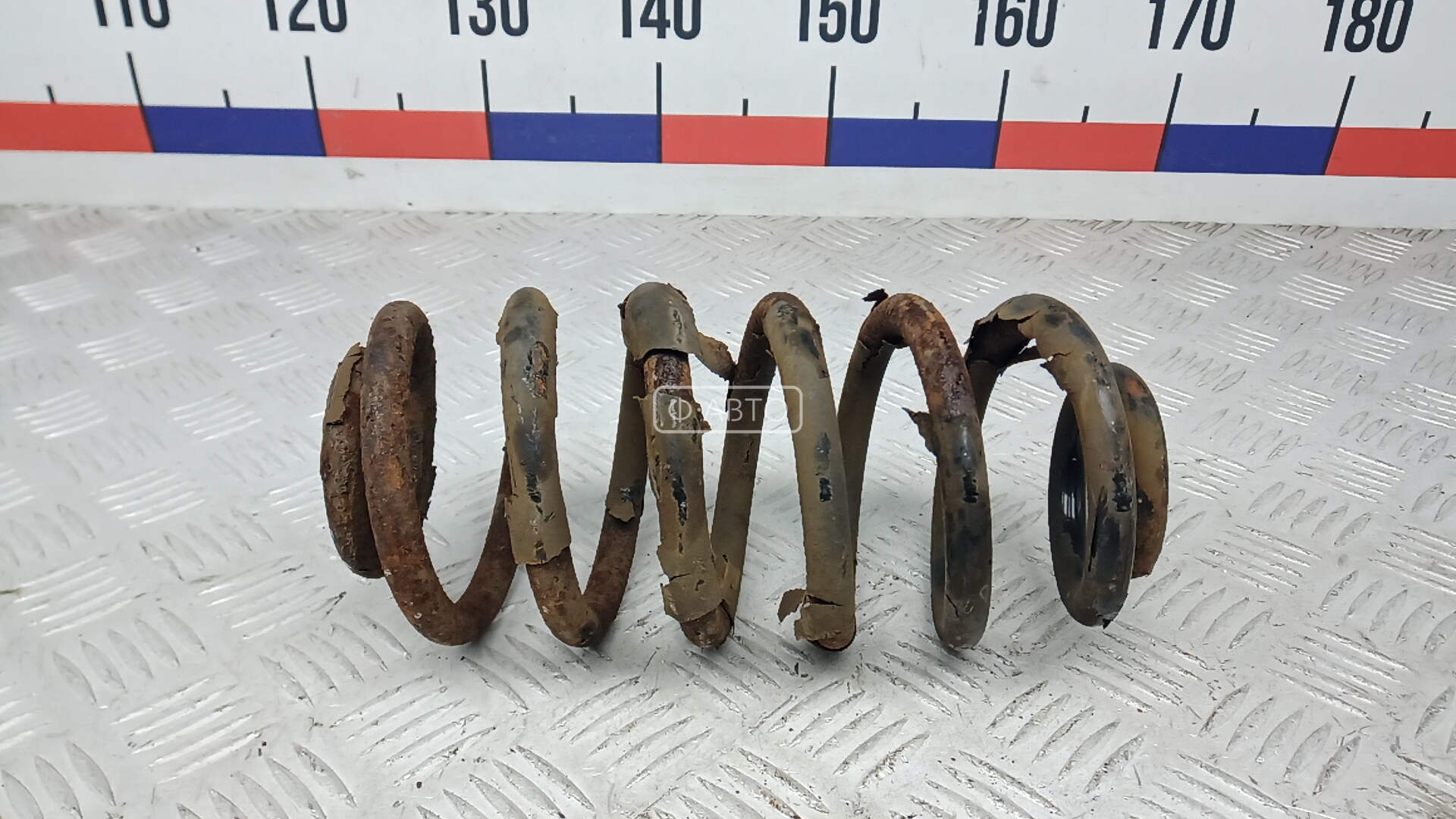 Пружина задняя