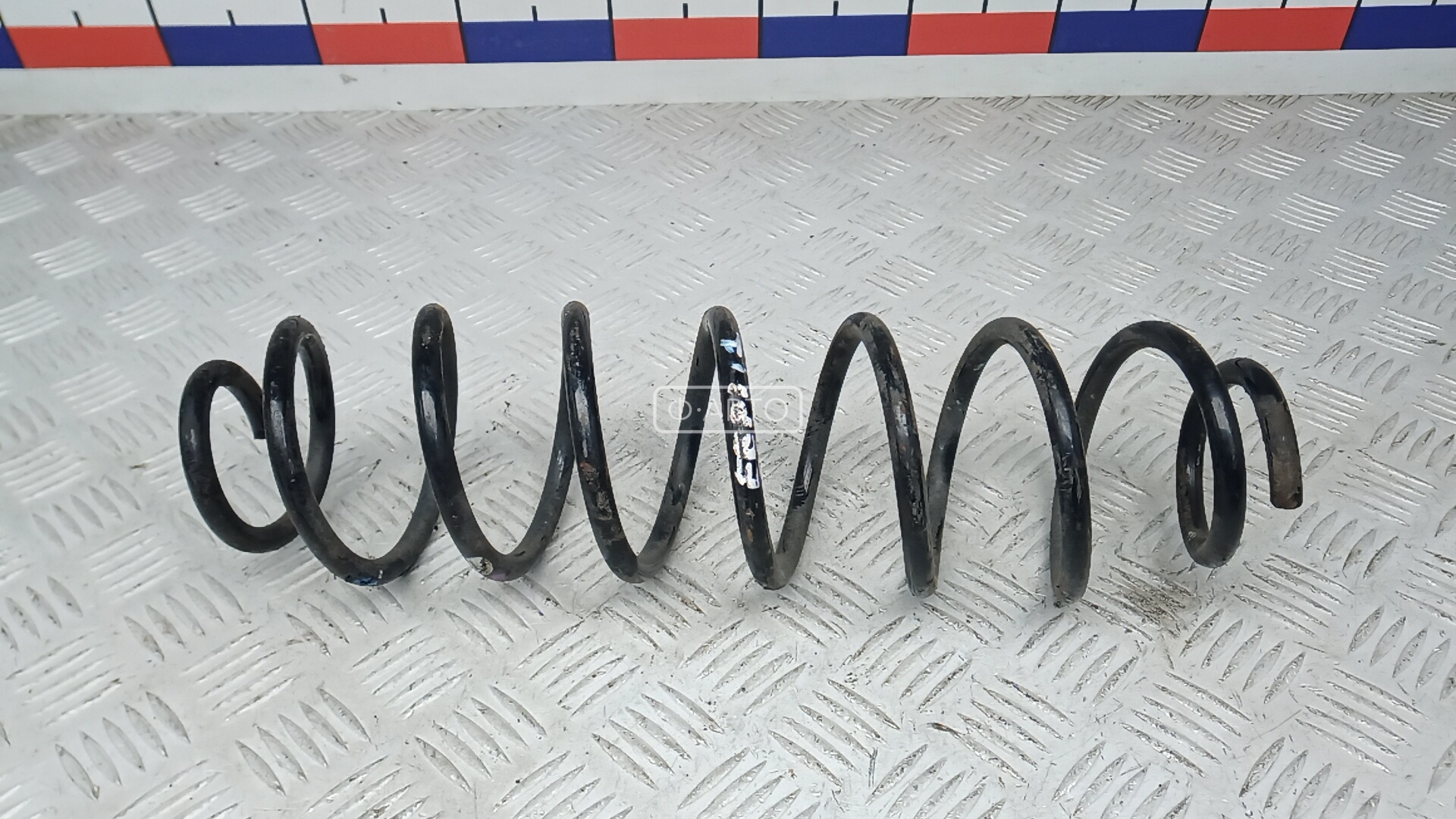 Пружина задняя