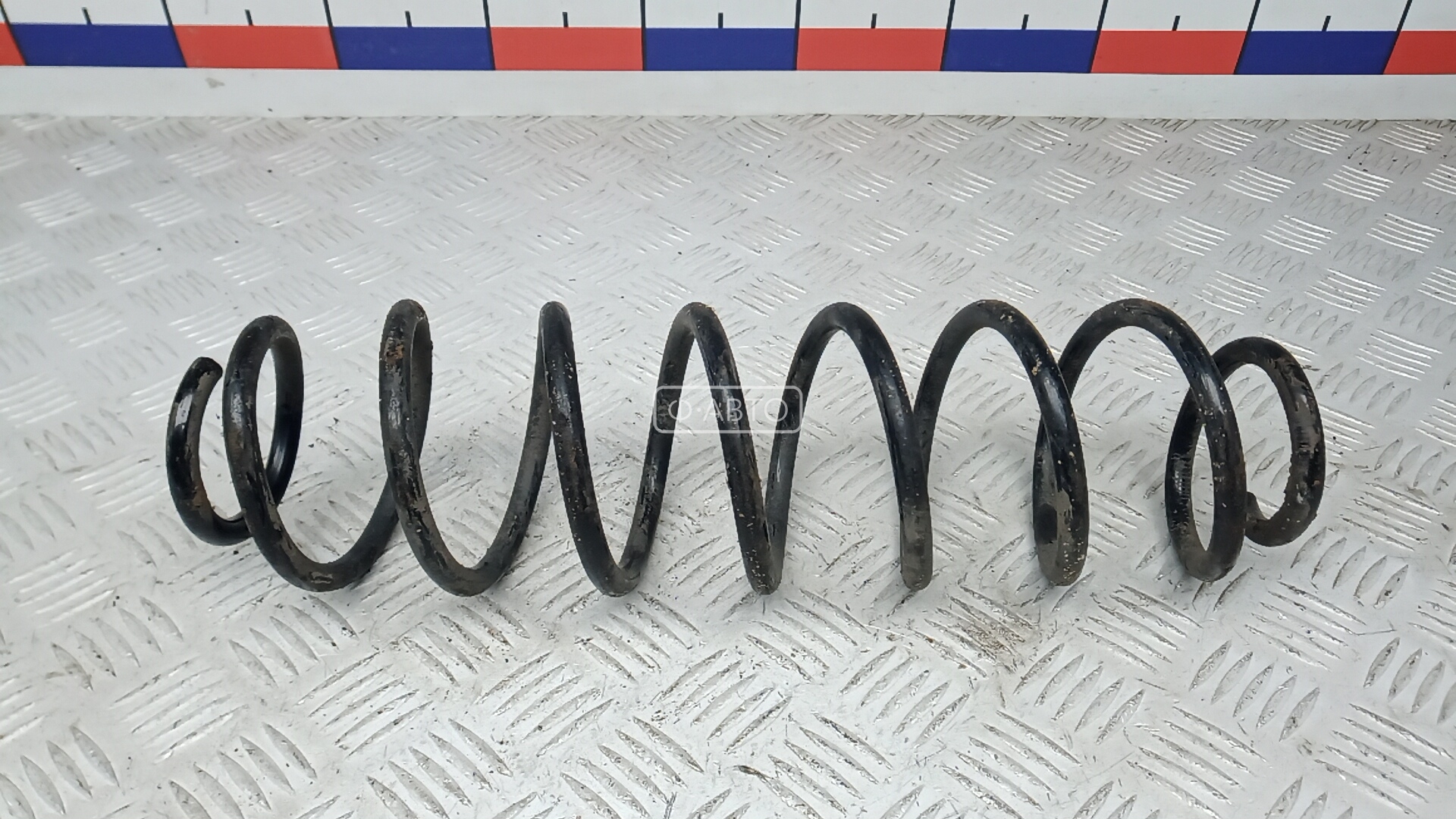 Пружина задняя