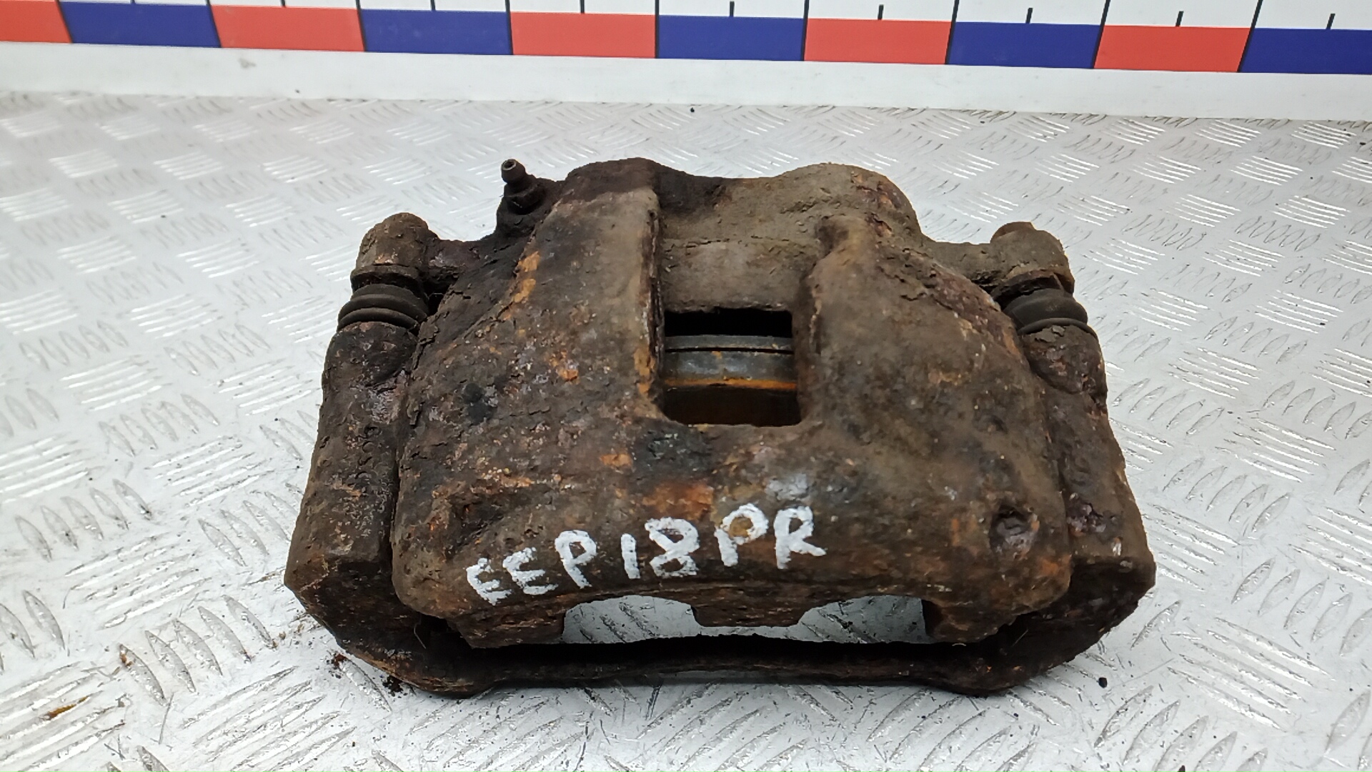 Суппорт тормозной передний правый FORD TRANSIT 7