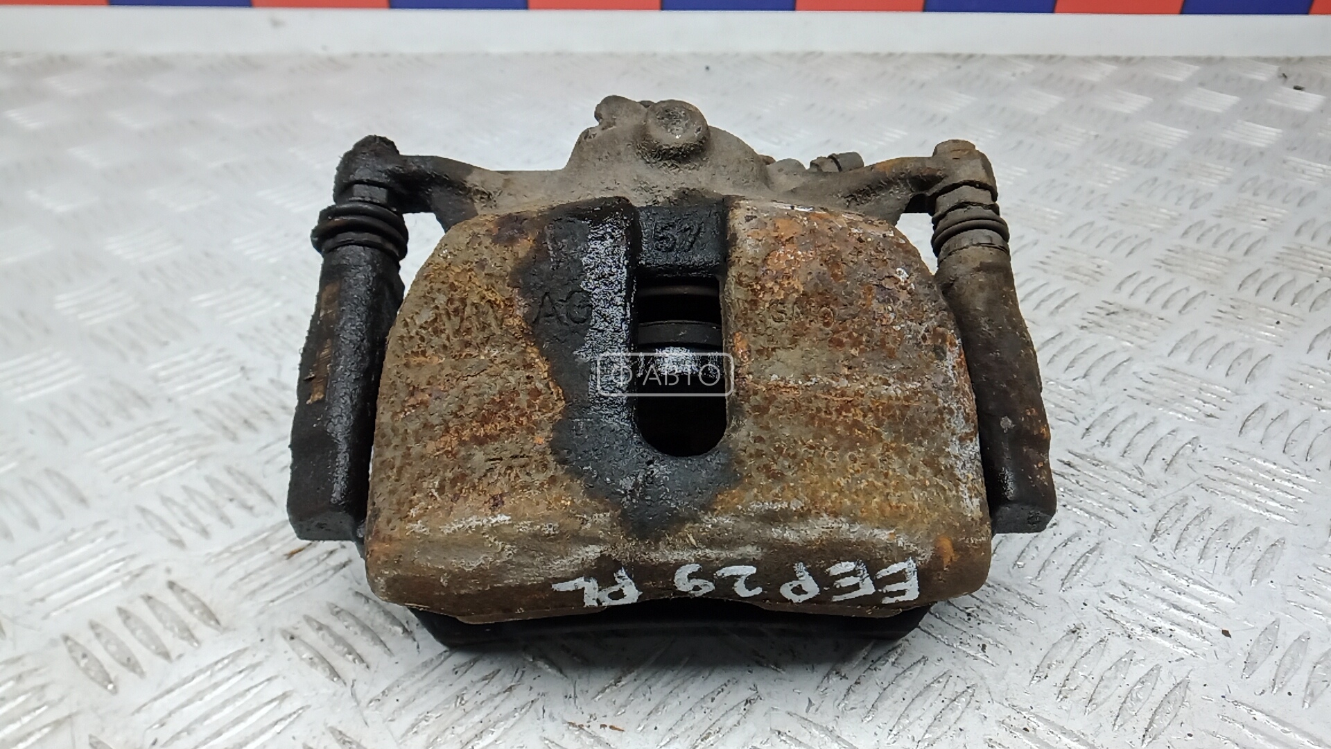 Суппорт тормозной передний левый