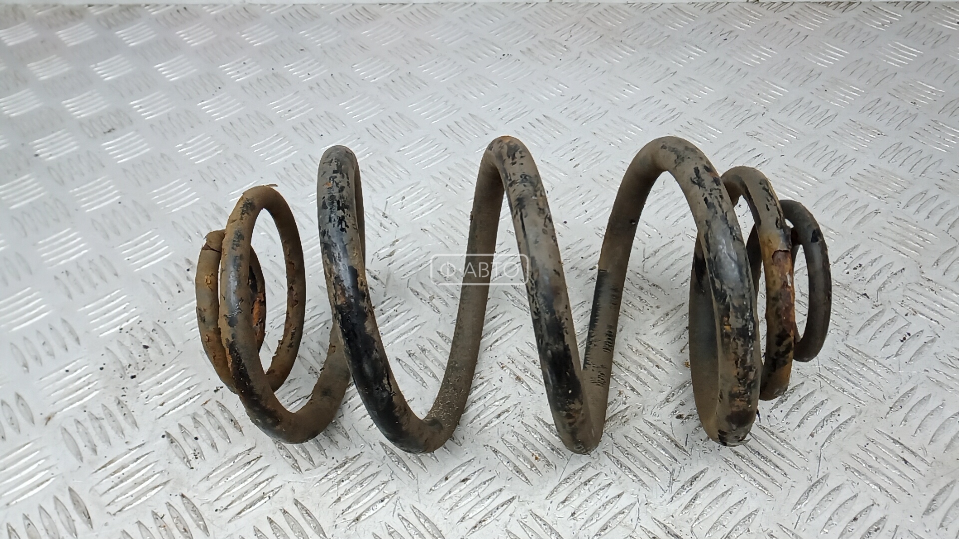 Пружина задняя