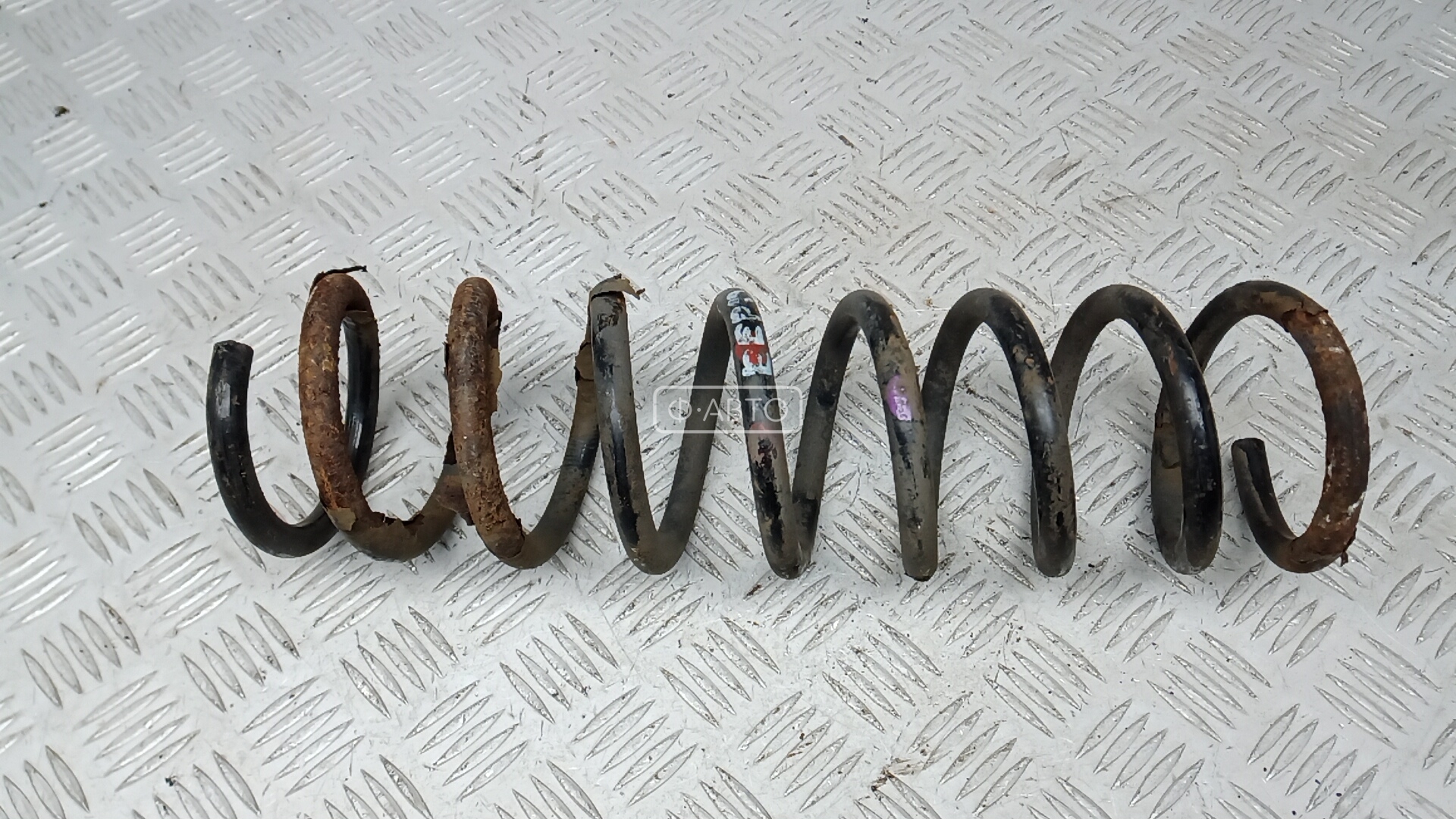 Пружина задняя