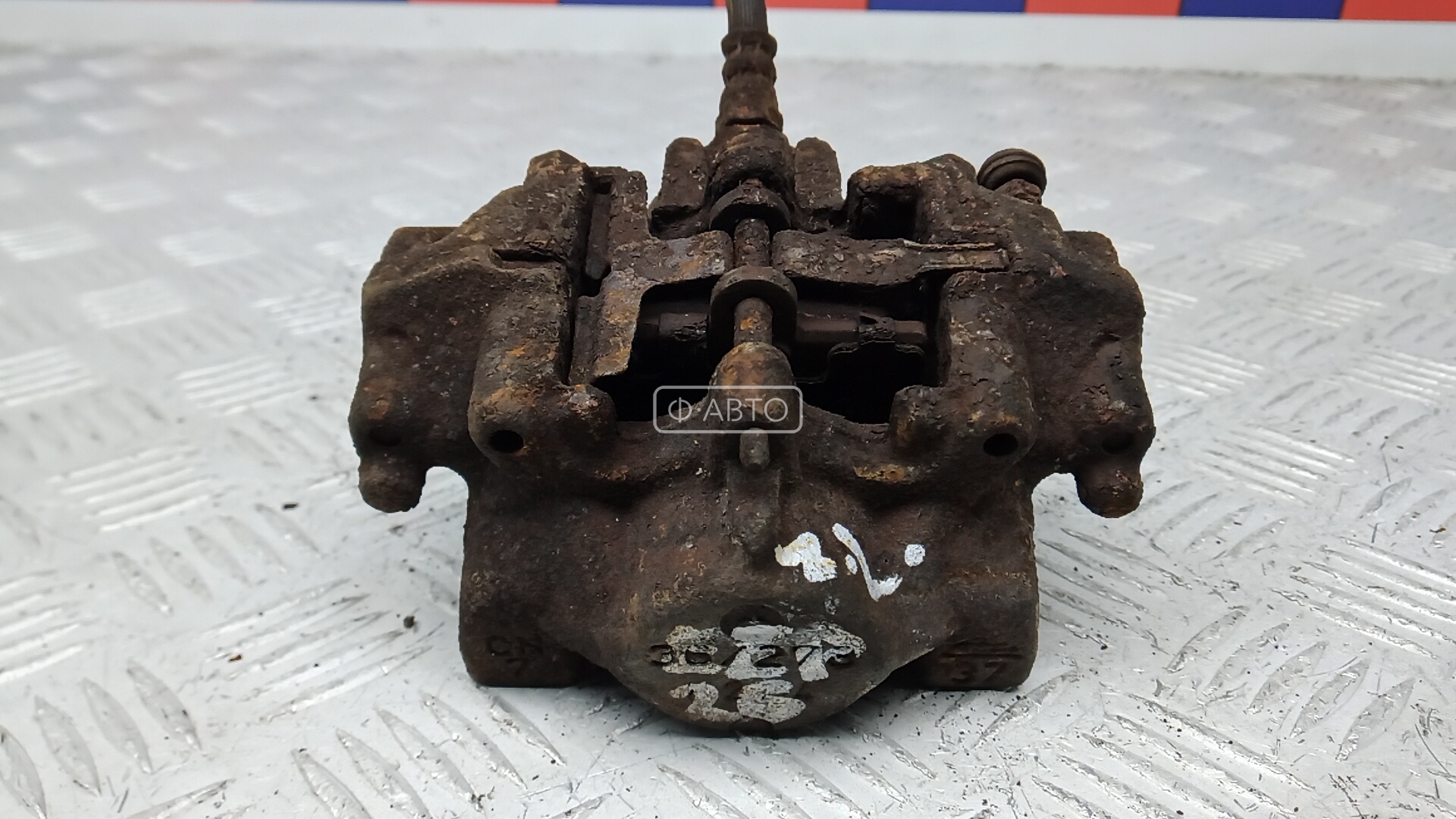 Суппорт тормозной задний левый