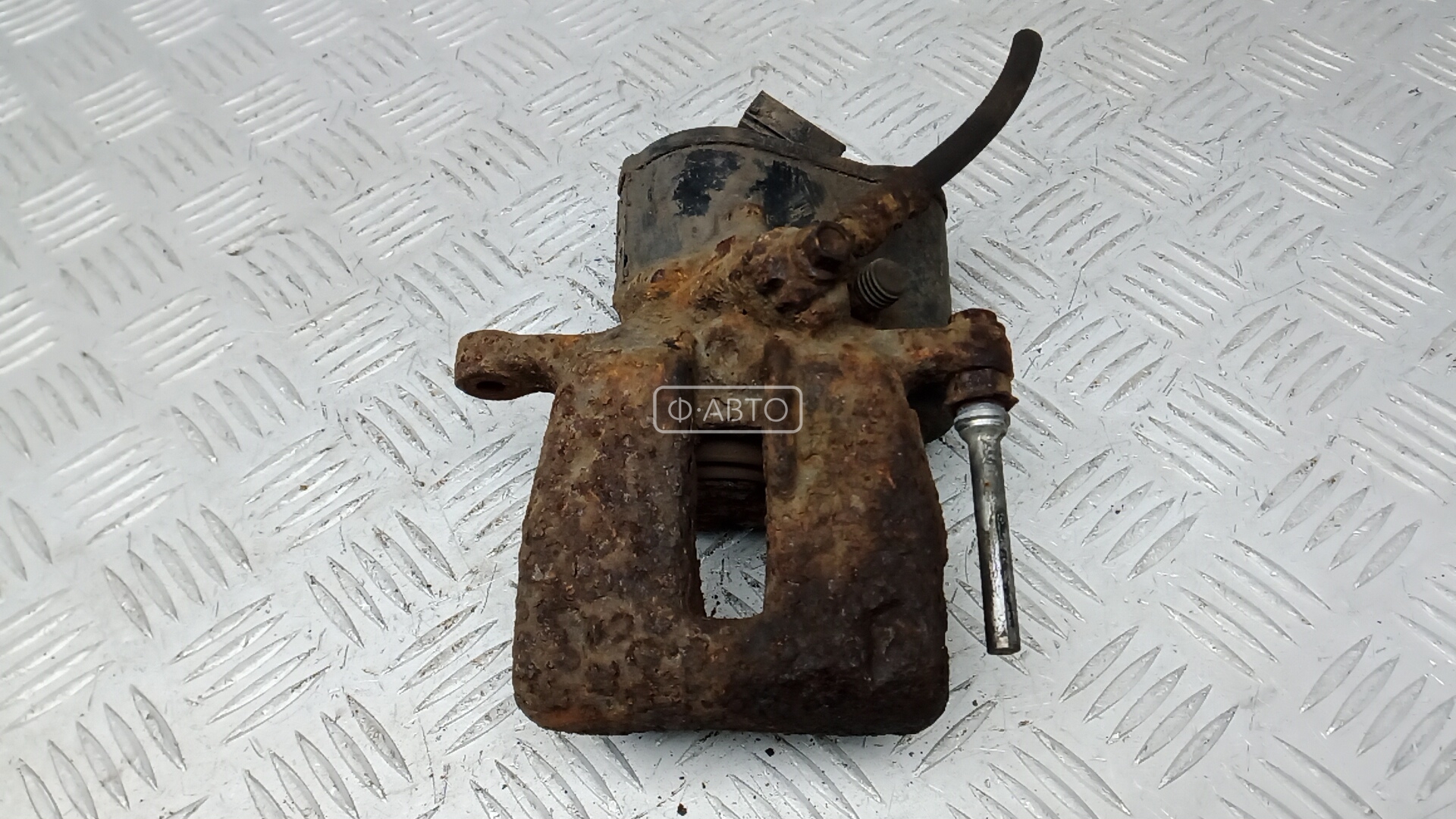 Суппорт тормозной задний левый