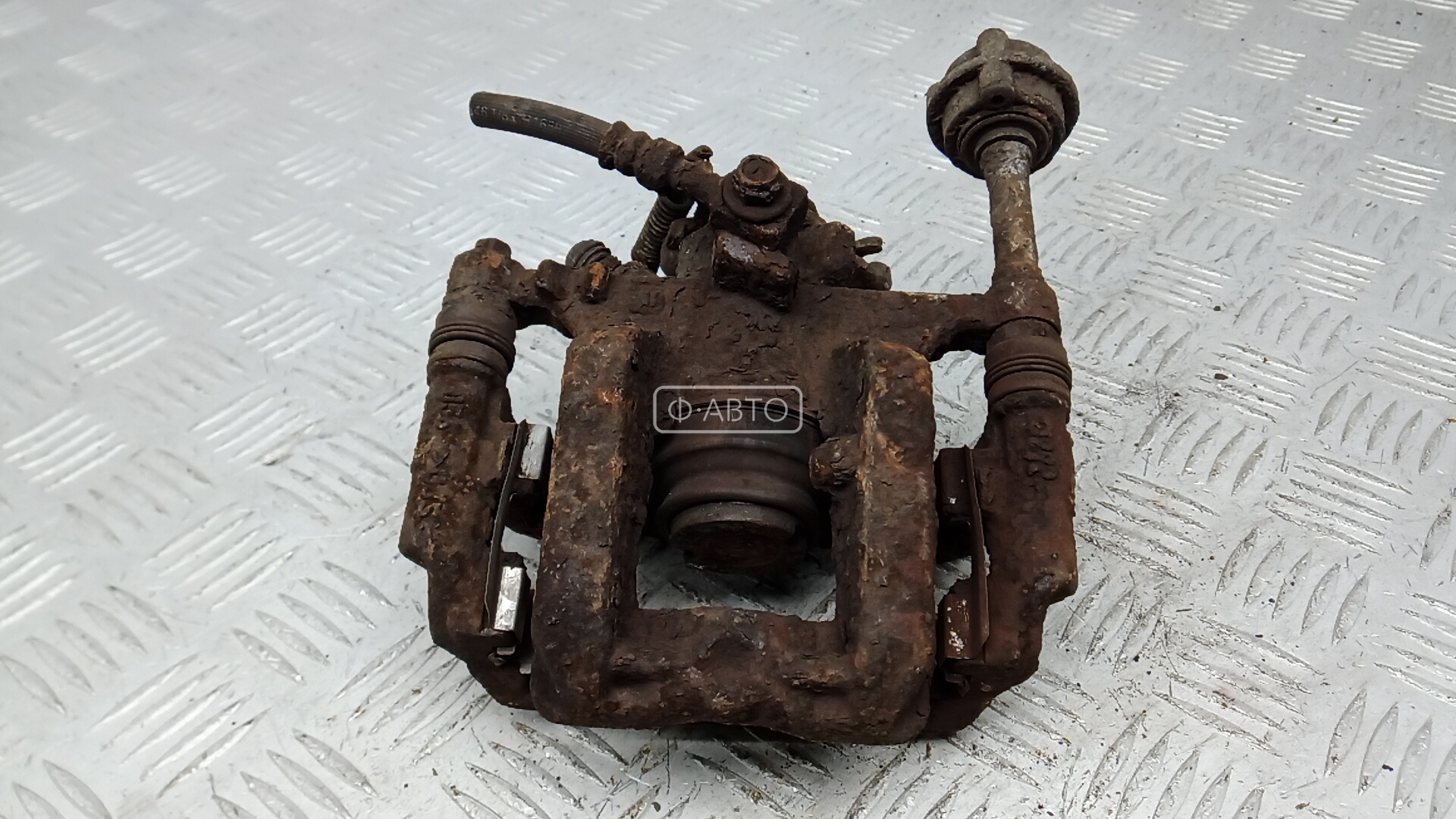 Суппорт тормозной задний левый