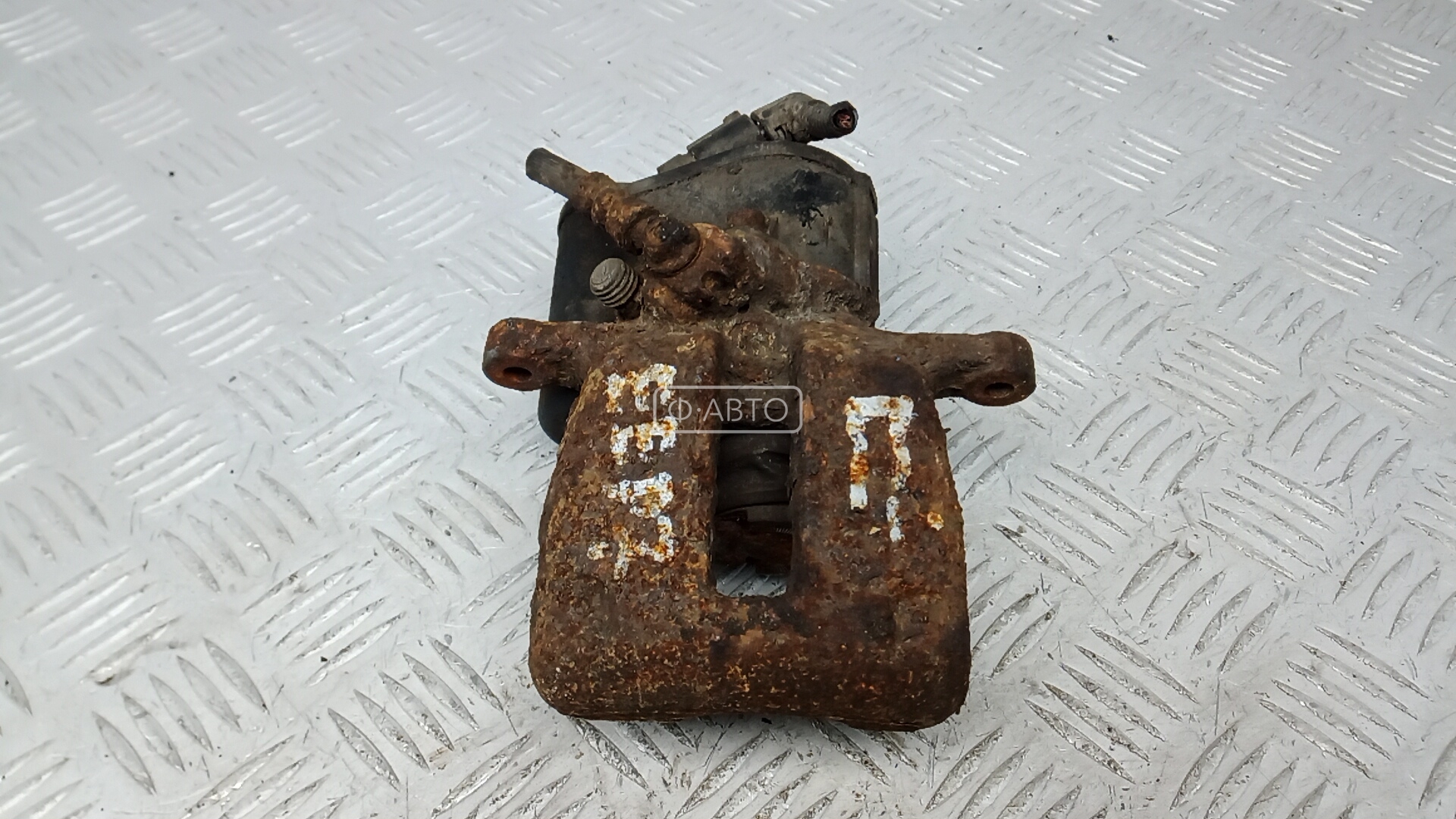 Суппорт тормозной задний правый