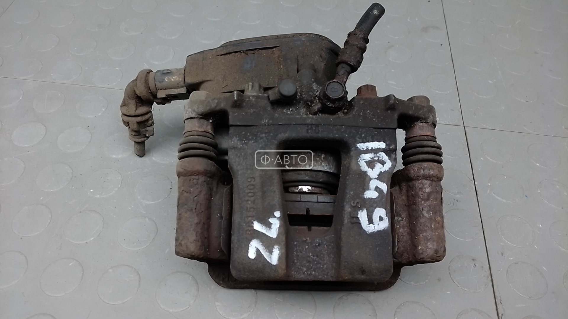 Суппорт тормозной задний левый