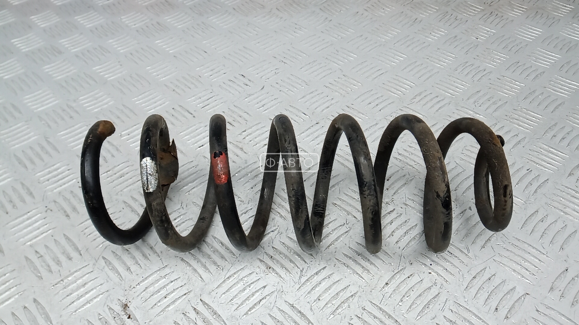 Пружина задняя