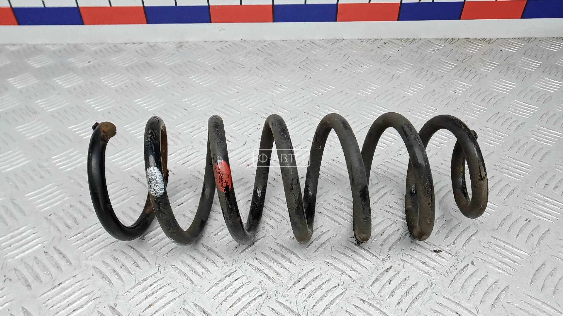 Пружина задняя